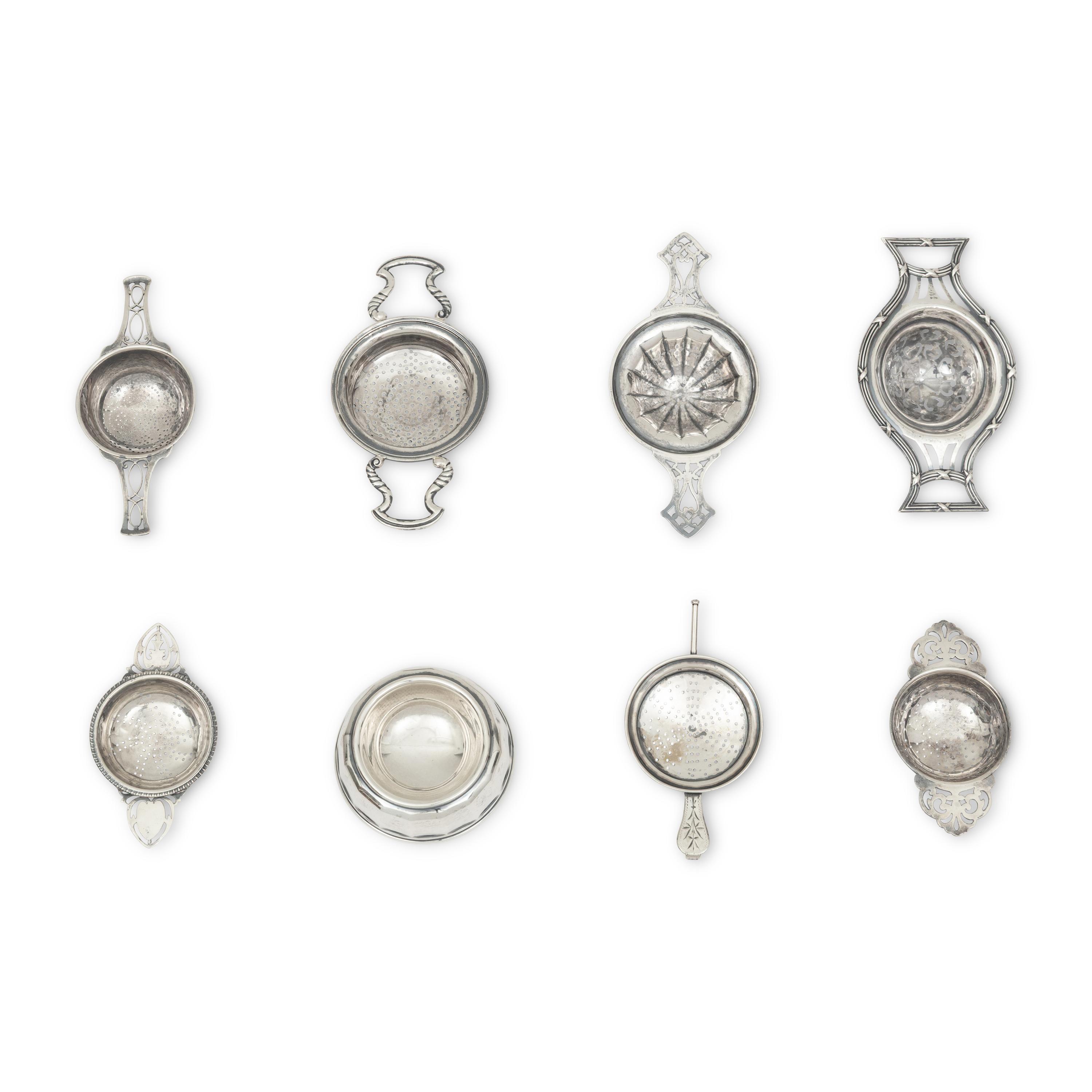 A Collection of Twenty Silver Tea Strainers