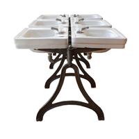 A Double-Sided Porcelain and Iron Six Basin Sink 41" W x 80" D x 31" H — United States, Circa 1930