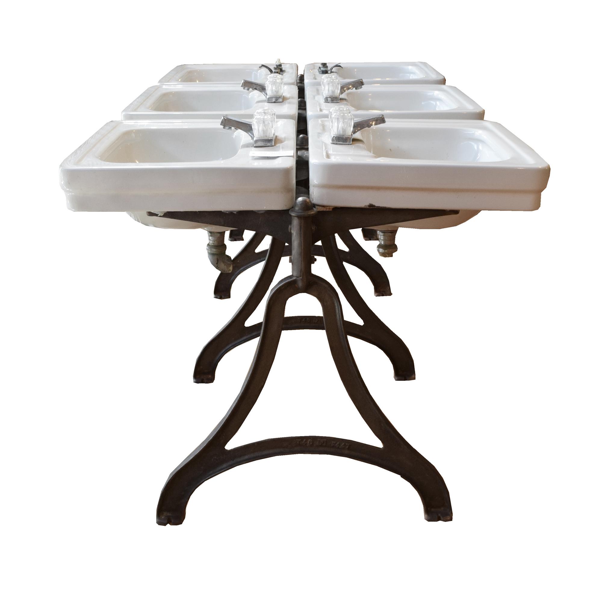 A Double-Sided Porcelain and Iron Six Basin Sink 41" W x 80" D x 31" H — United States, Circa 1930
