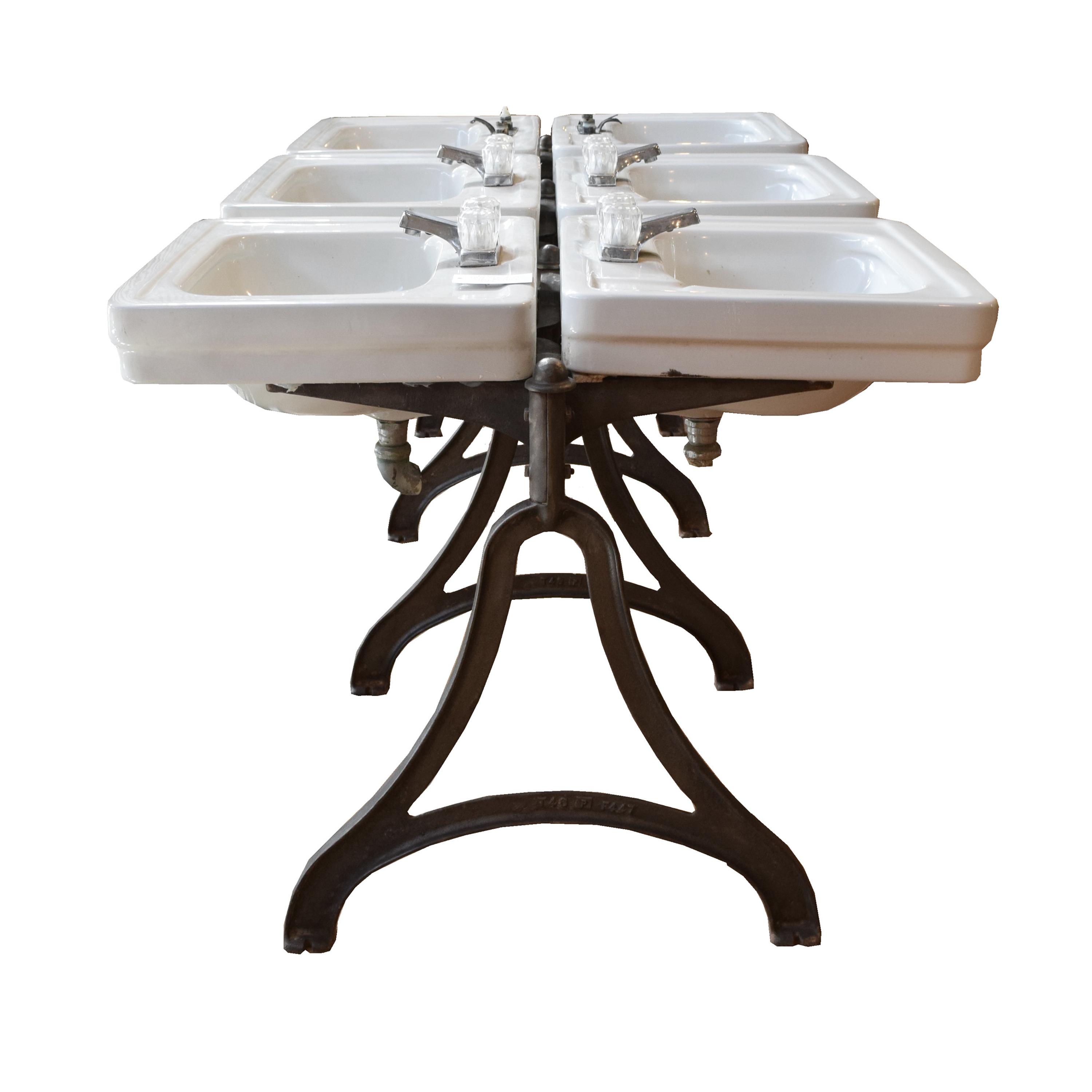 A Double-Sided Porcelain and Iron Six Basin Sink 41" W x 80" D x 31" H — United States, Circa 1930