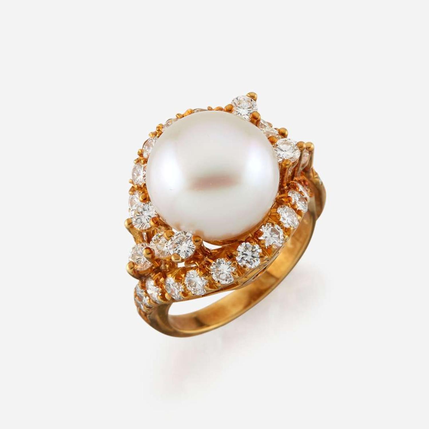 A cultured pearl, diamond, and gold ring