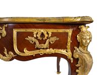 A Louis XV Style Gilt Bronze Mounted Kingwood Bureau Plat