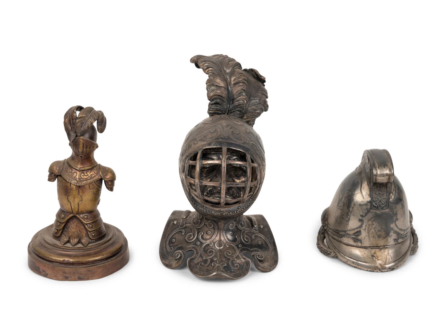 Two Knight Inkwells and a Helmet Inkwell