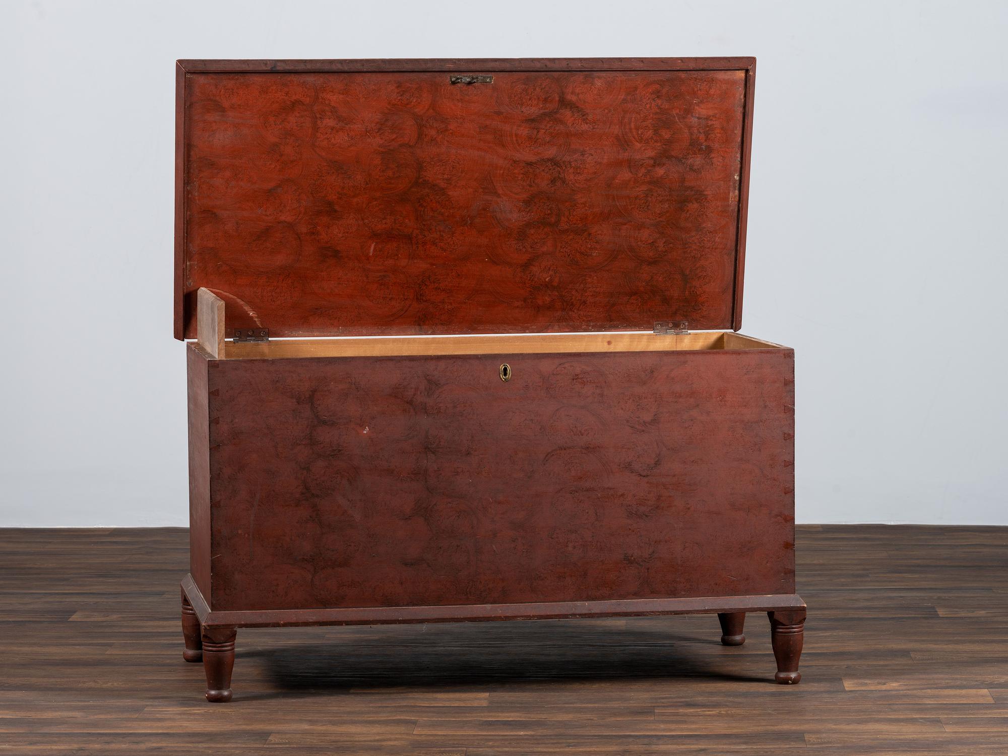 A Country Red and Grain Painted Poplar Blanket Chest