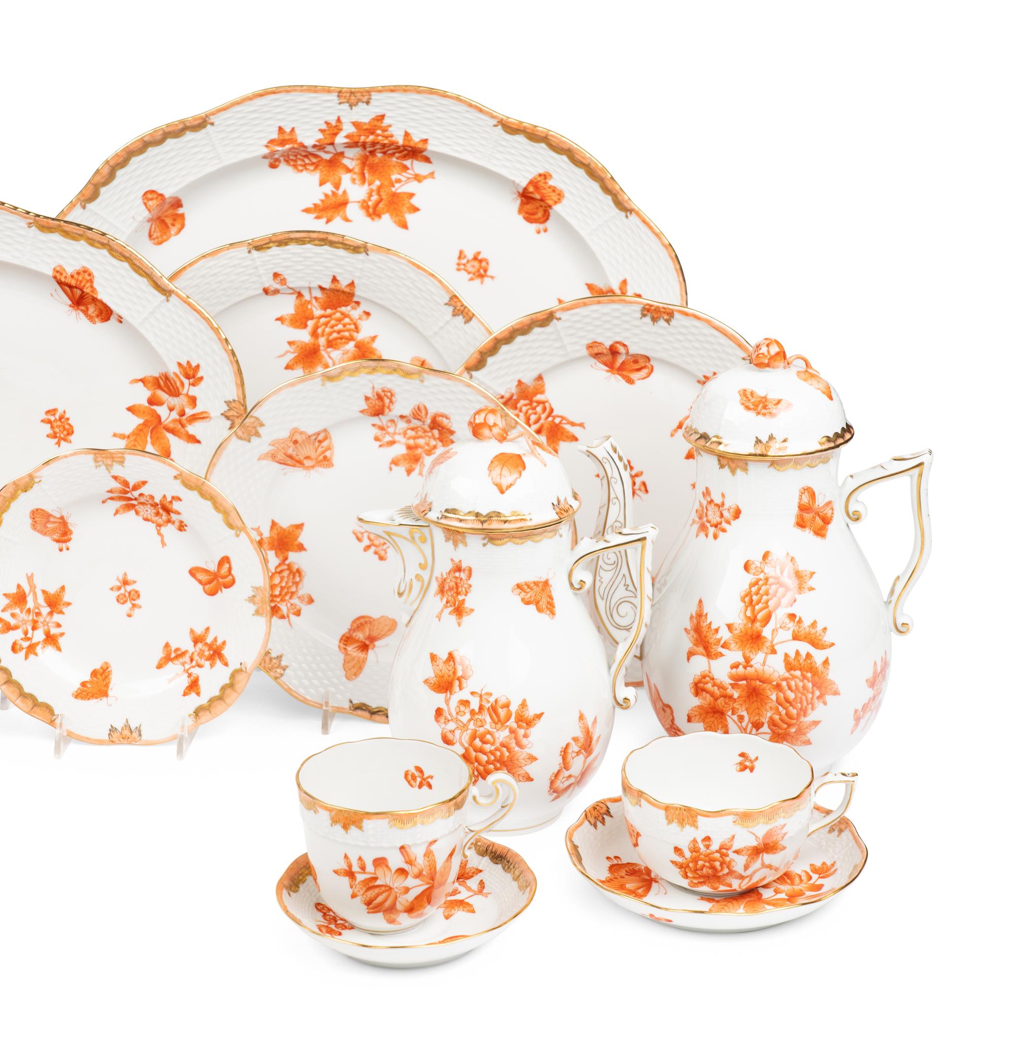 A Herend Fortuna Rust Porcelain Dinner Service