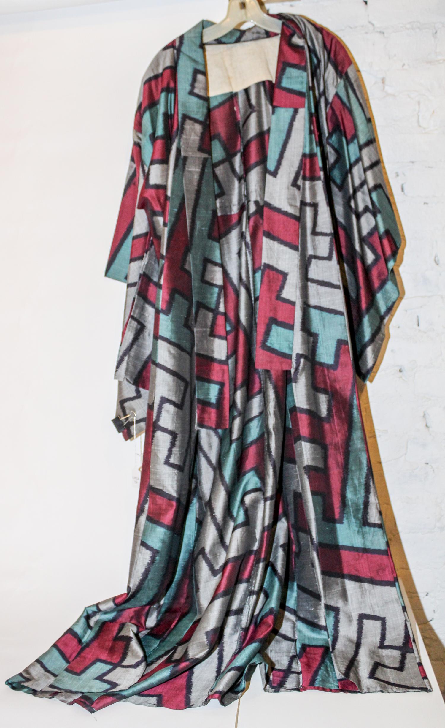 A Collection of Four Japanese Kimonos. Length of largest 58 1/2 x width 49 1/2 inches.