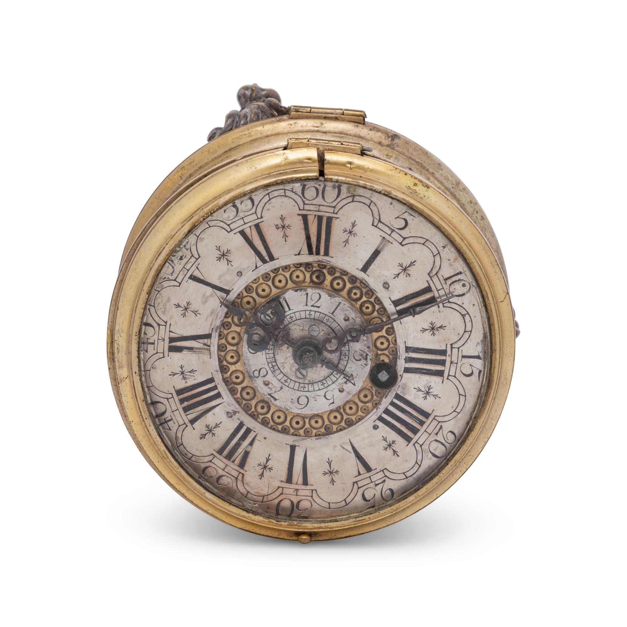 A German Gilt Metal and Silvered Brass Table Clock