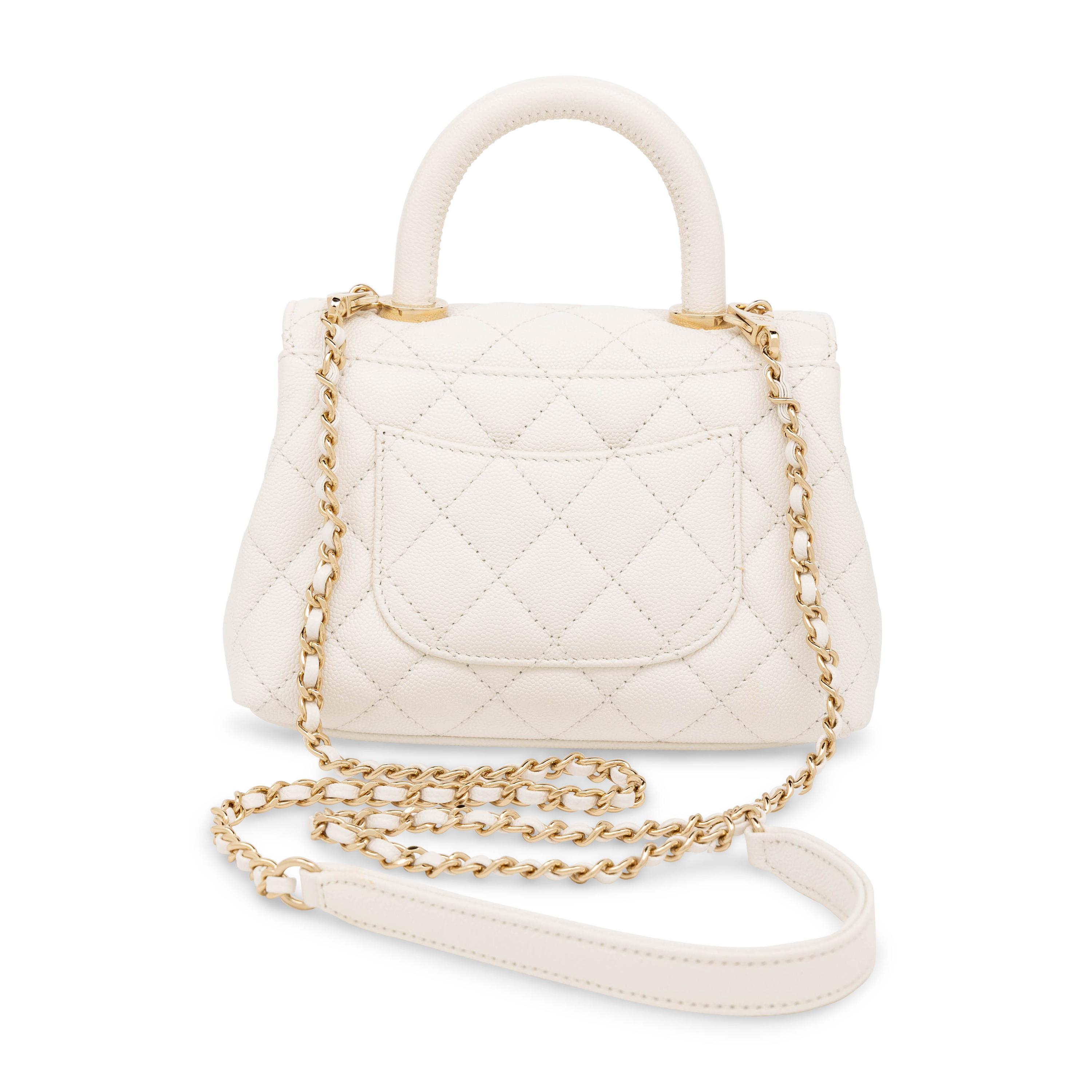 Chanel, Mini Top Handle Flap Bag in White Caviar Leather