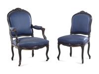 A Rococo Revival Ebonized Walnut Four-Piece Parlor Suite