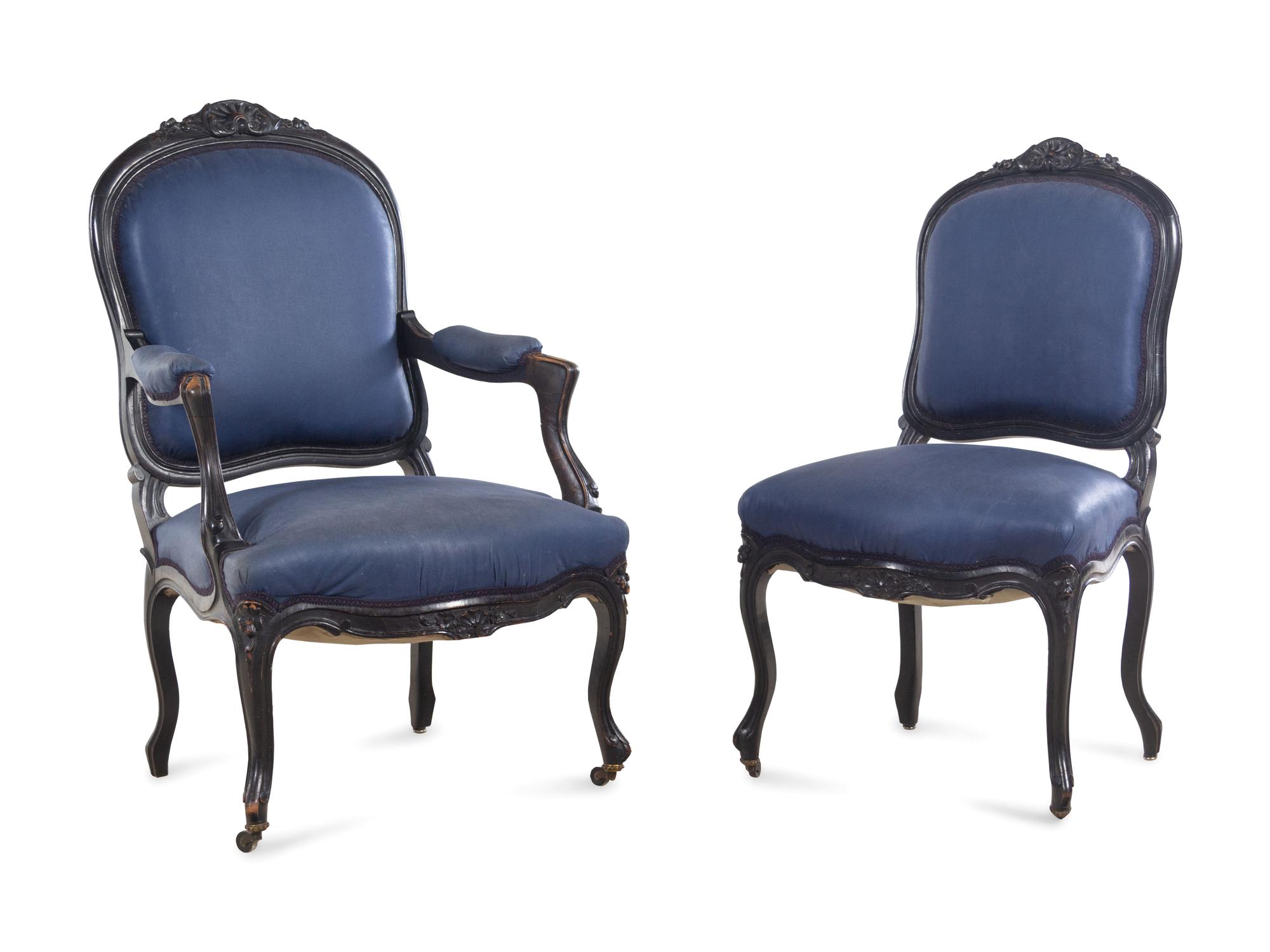 A Rococo Revival Ebonized Walnut Four-Piece Parlor Suite