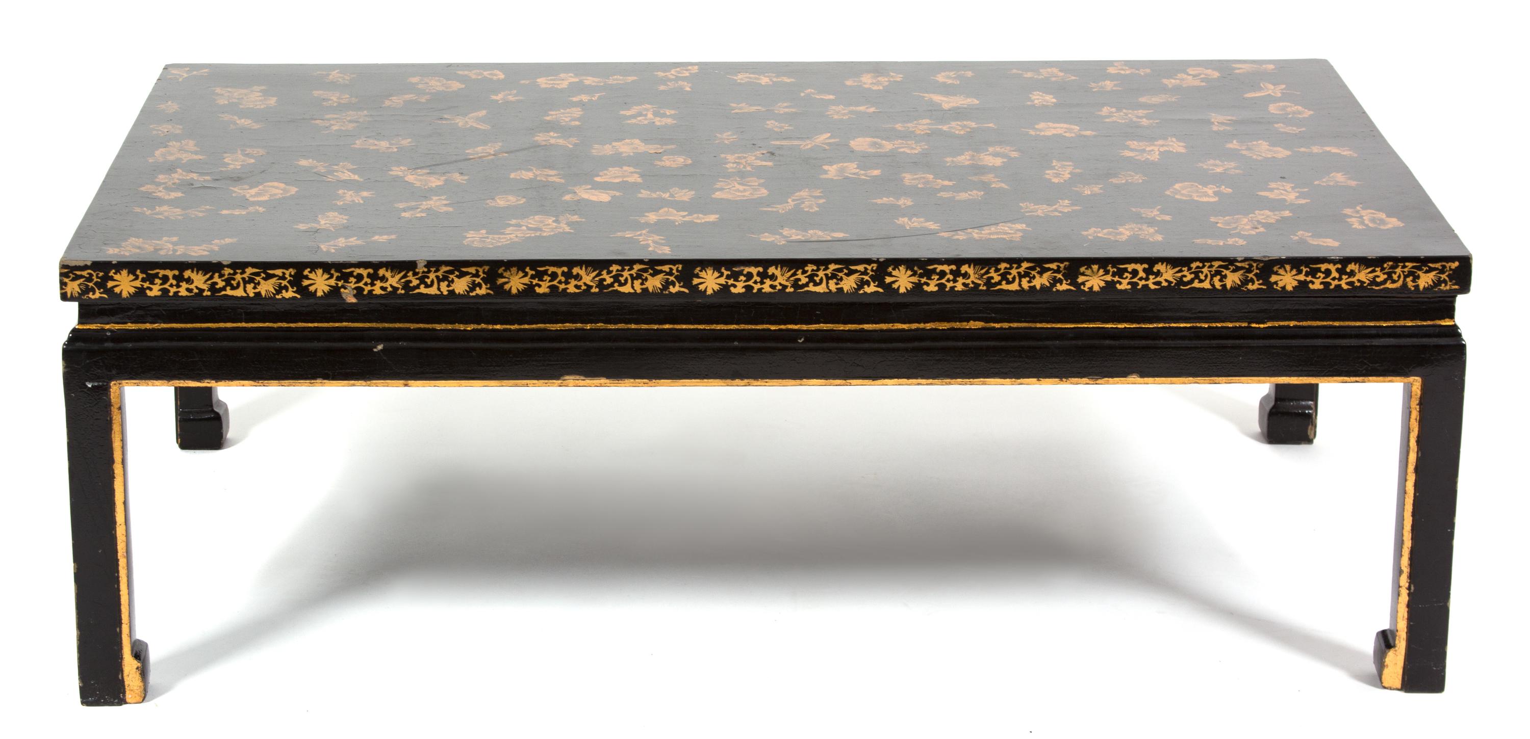 A Chinese Black and Gilt Lacquer Low Table Height 16 x width 47 1/4 x depth 29 1/2 inches. — 20TH CENTURY