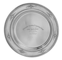 An American Silver Presentation Plate, Reed & Barton, Taunton, MA, having a foliate decorated rim with a ribbon and foliate cartouche d