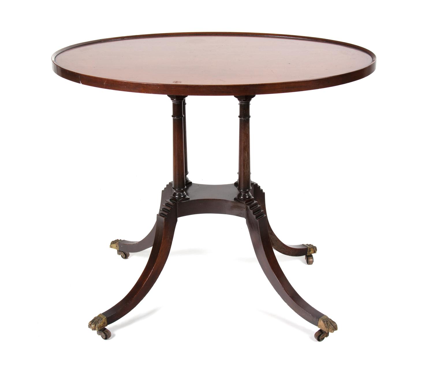 A Regency Style Oval Top Tea Table Height 28 3/4 x width 34 x depth 24 inches. — 20TH CENTURY