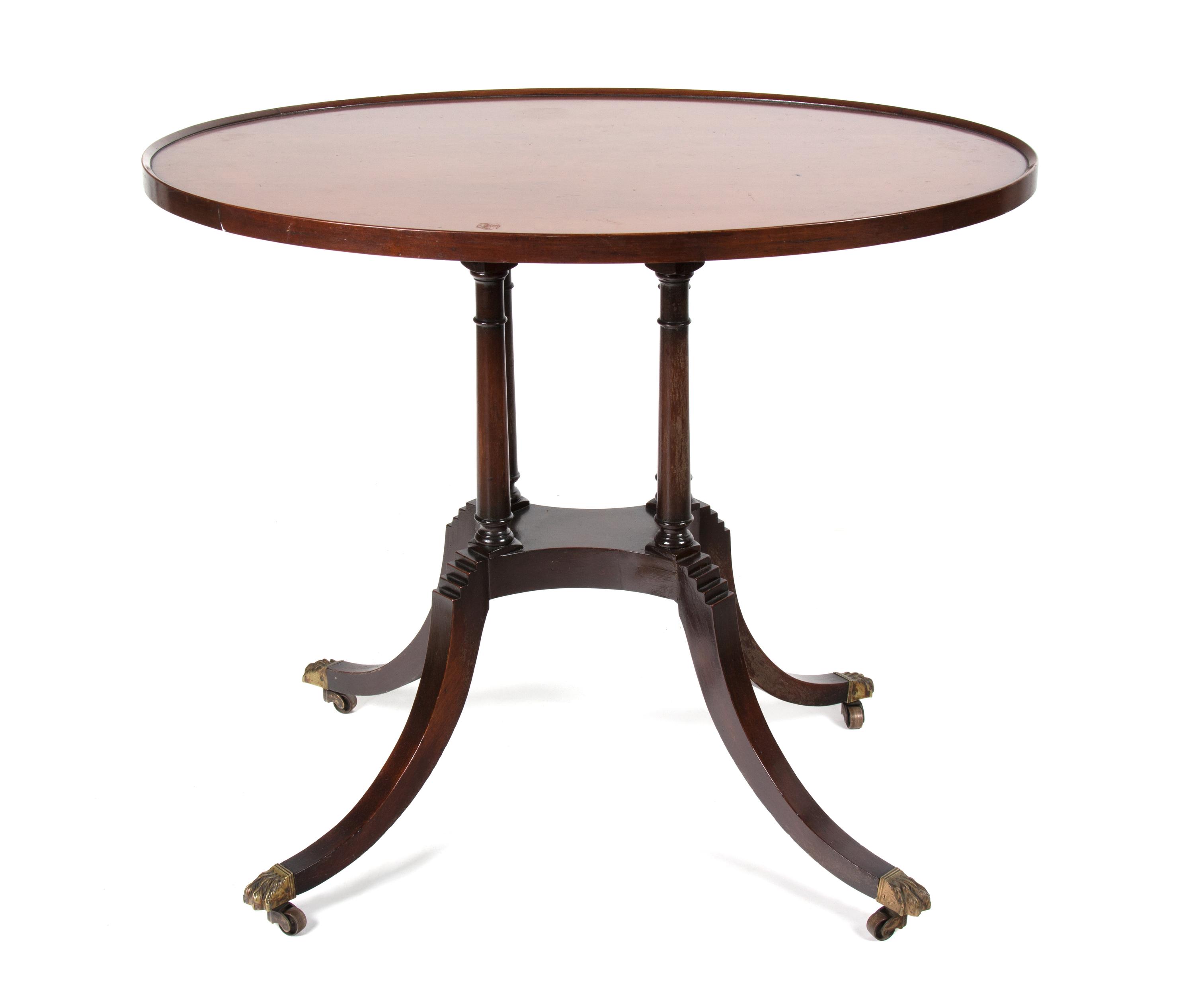 A Regency Style Oval Top Tea Table Height 28 3/4 x width 34 x depth 24 inches. — 20TH CENTURY