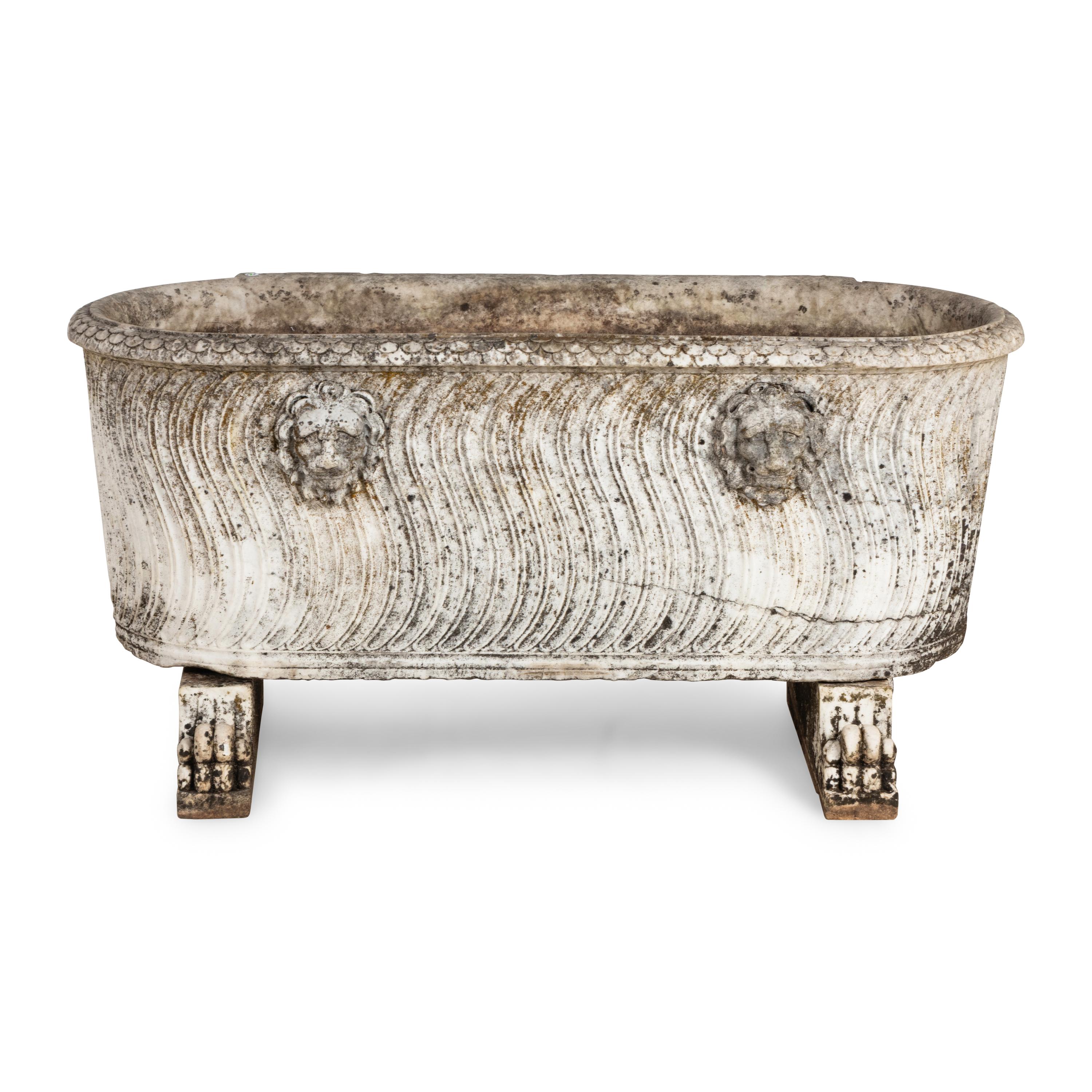 A Neoclassical Carved Marble Sarcophagus