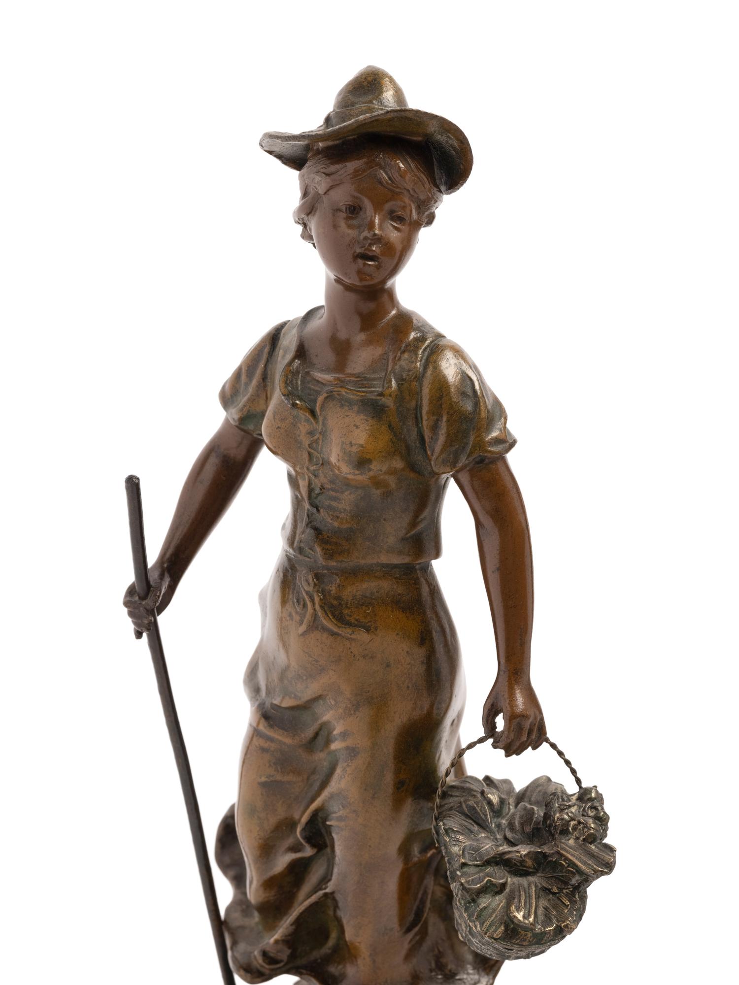 A Pair of French Cast Metal Figures