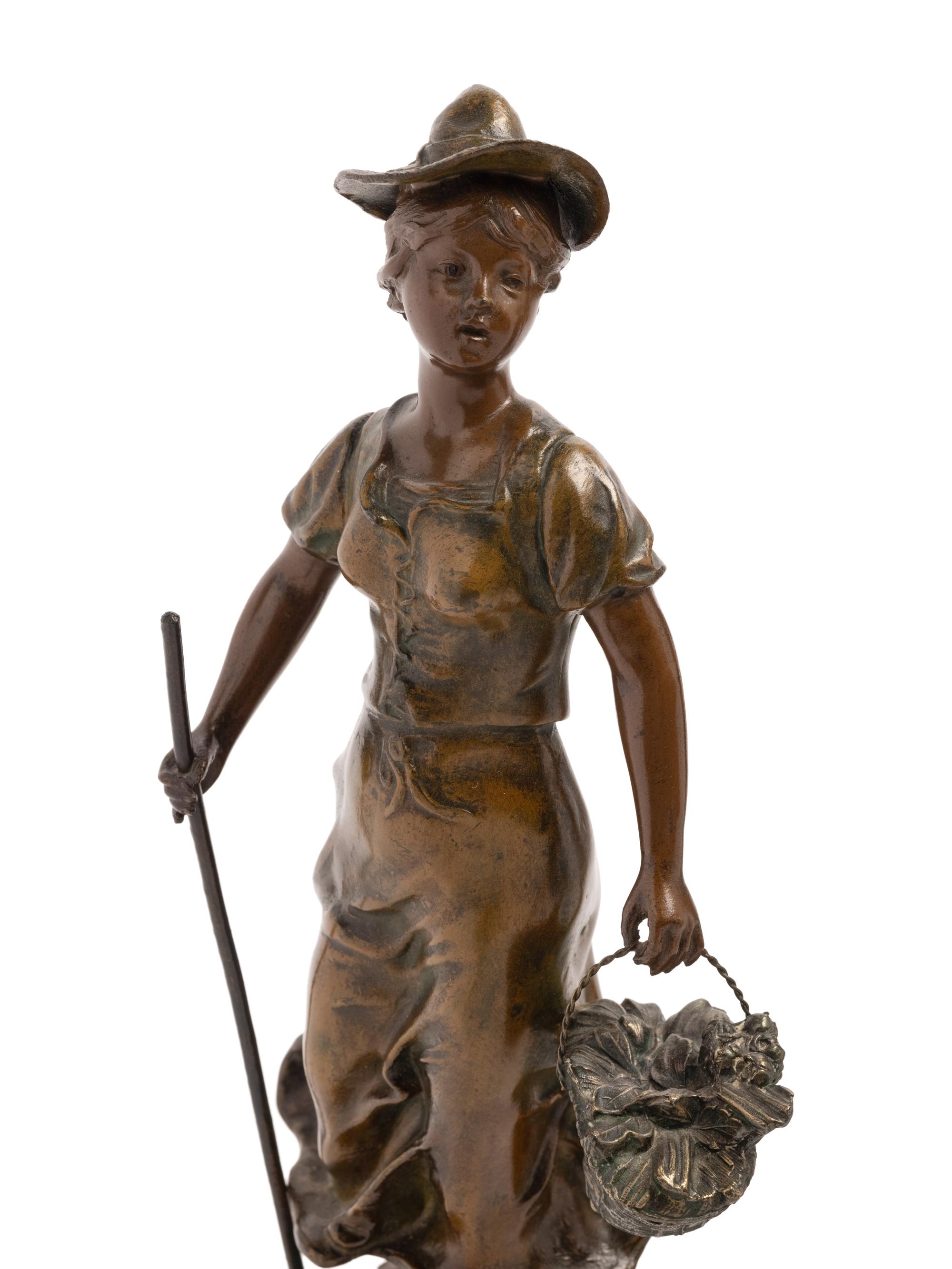 A Pair of French Cast Metal Figures