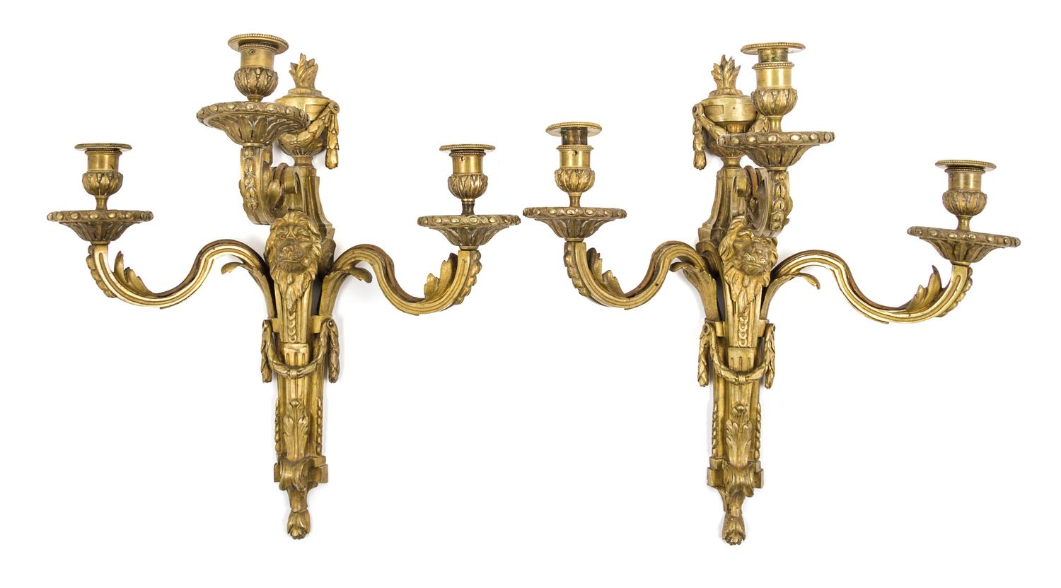 A Pair of Neoclassical Gilt Bronze Three-Light Sconces Height 18 1/4 inches.