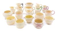 Eighteen Belleek Creamers and Saucers Height of tallest 3 3/4 inches. — SECOND BLACK MARK THROUGH SEVENTH GOLD MARK (1891-1993)