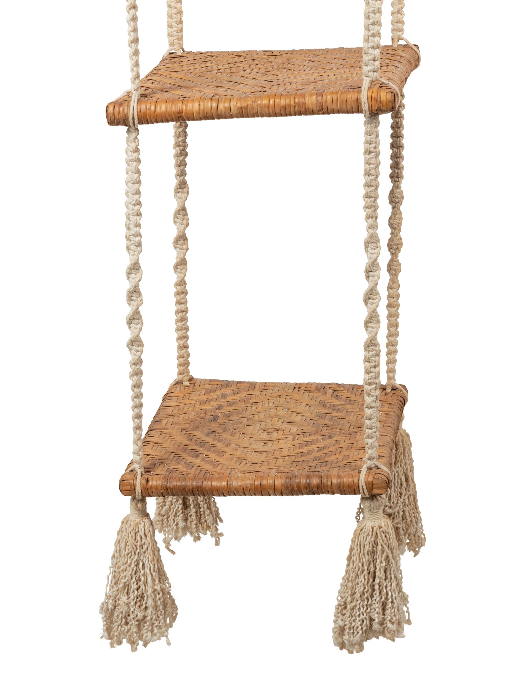 A Three-Tier Cord and Rattan Hanging Shelf Unit