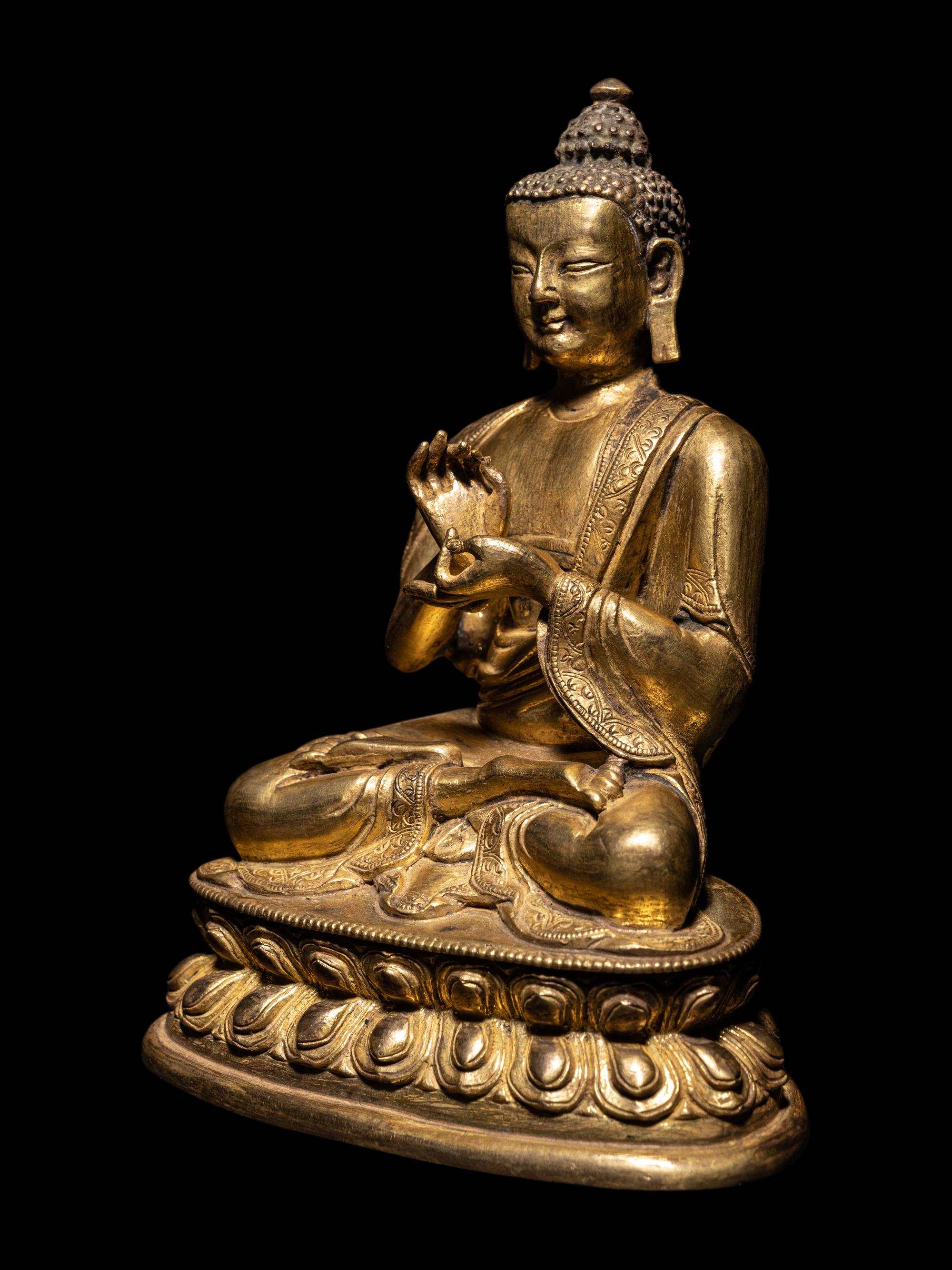 A Sino-Tibetan Gilt Bronze Seated Figure of Buddha Shakyamuni