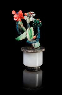 A Chinese Jadeite Archer’s Ring Mounted as Hardstone Flower Tree 19TH/20TH CENTURY Height 3 7/8 inches. — 19TH/20TH CENTURY