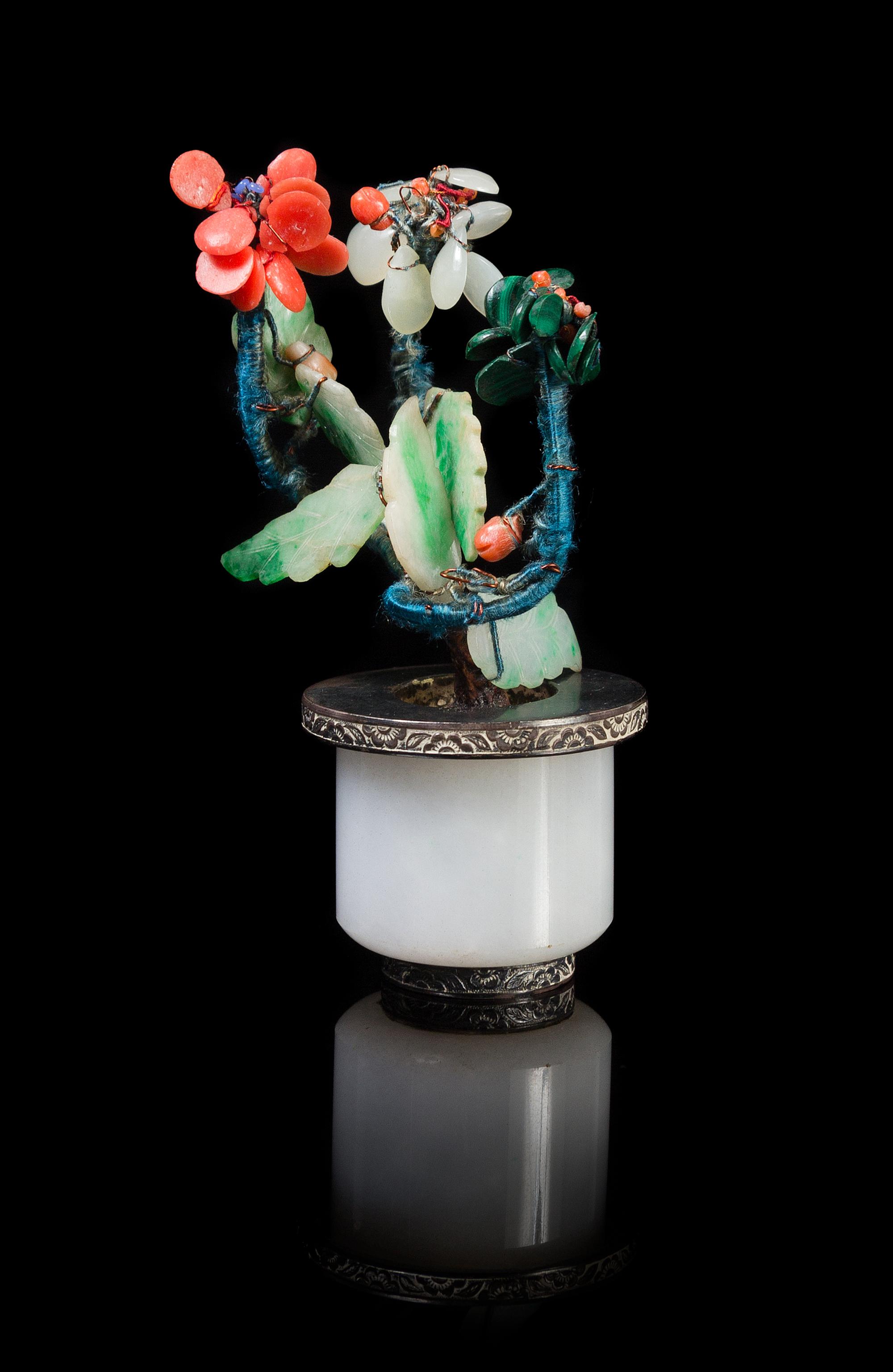 A Chinese Jadeite Archer’s Ring Mounted as Hardstone Flower Tree 19TH/20TH CENTURY Height 3 7/8 inches. — 19TH/20TH CENTURY