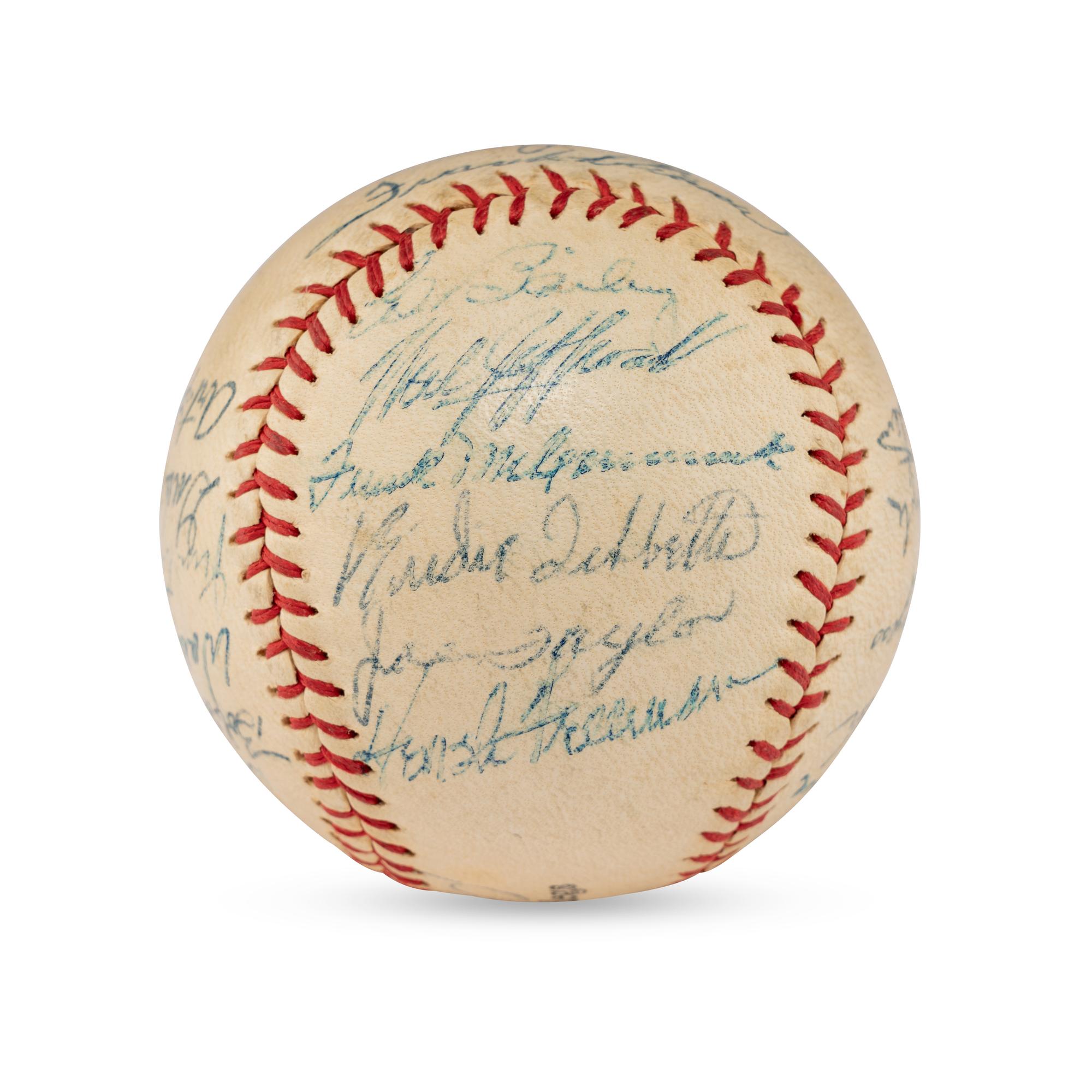 A 1957 Cincinnati Reds Team Signed Autograph Baseball Including Early Career Frank Robinson Signature