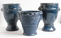 A Pair of Ceramic Lion Mask Vases Height of first pair 12 inches.