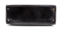 An Hermes 35cm Black Leather Kelly Bag, 13 1/2 x 9 1/2 x 5 inches.