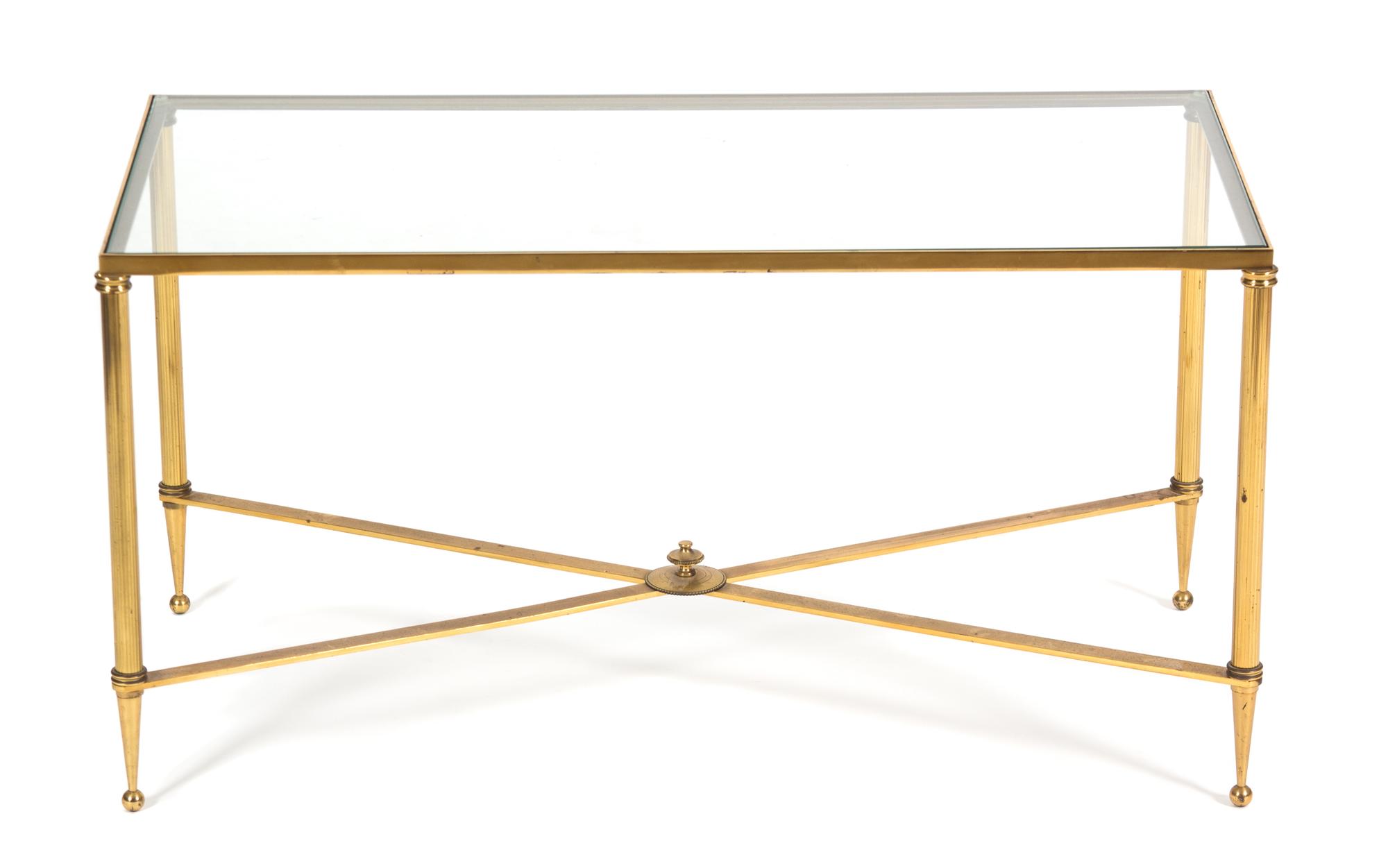 A Neoclassical Style Brass Coffee Table Height 16 1/4 x width 31 1/2 x depth 16 inches. — 20TH CENTURY