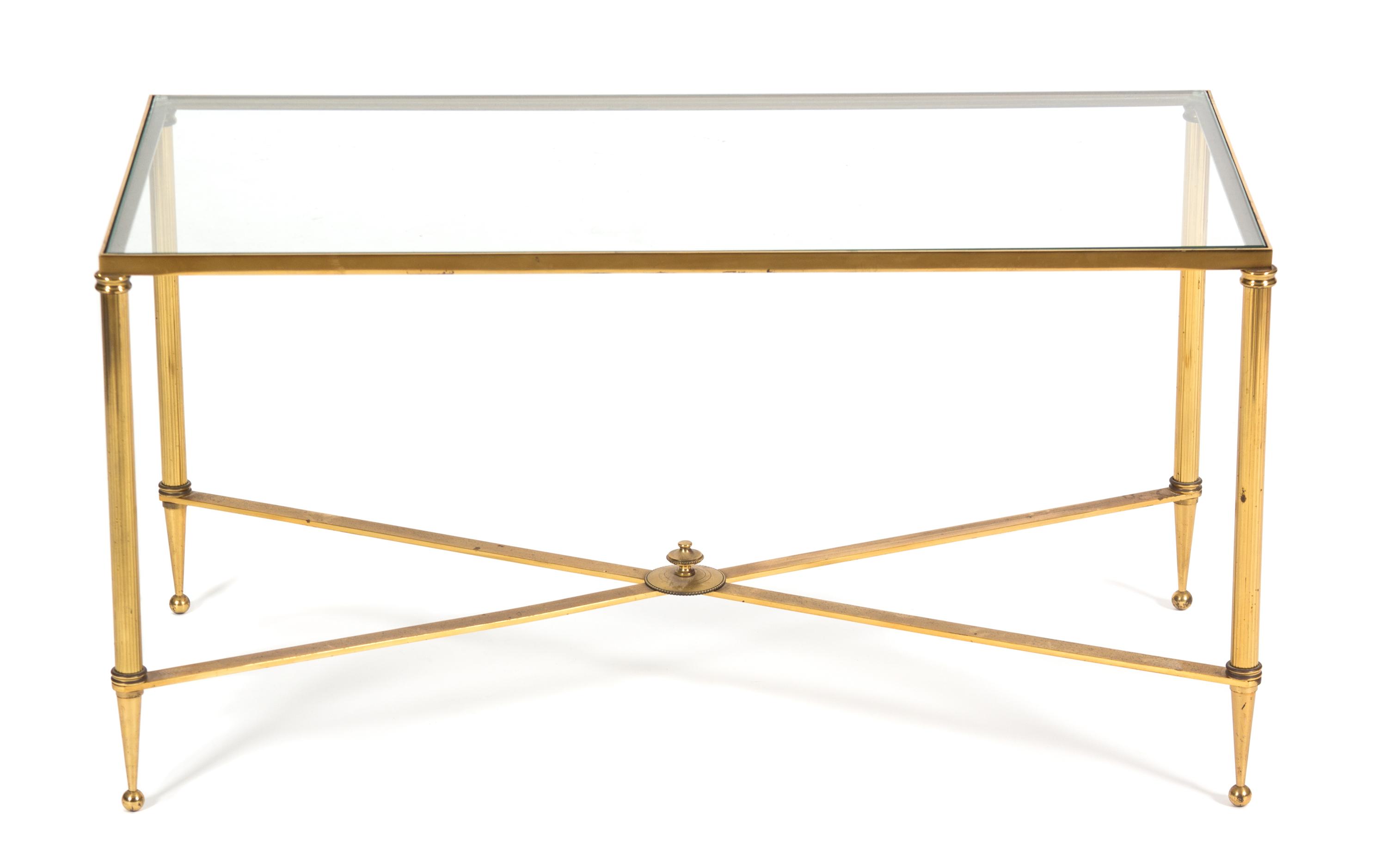 A Neoclassical Style Brass Coffee Table Height 16 1/4 x width 31 1/2 x depth 16 inches. — 20TH CENTURY