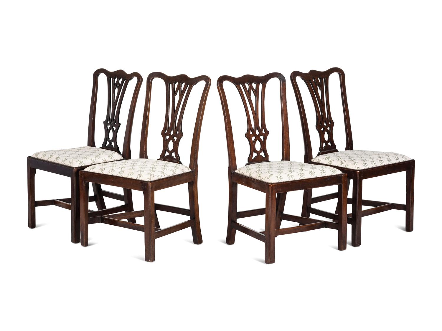 A Matched Set of Four Chippendale Walnut Side Chairs