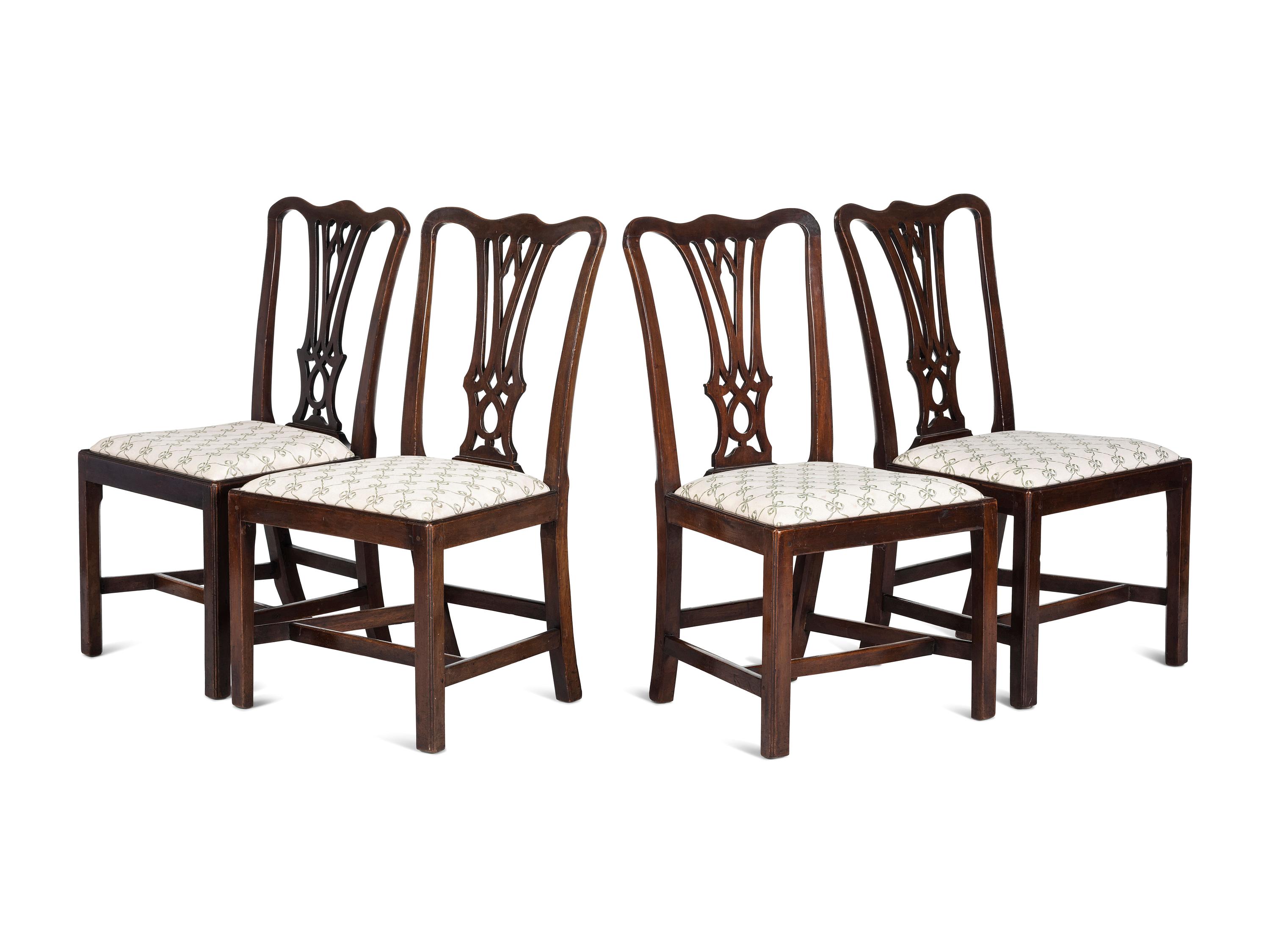 A Matched Set of Four Chippendale Walnut Side Chairs