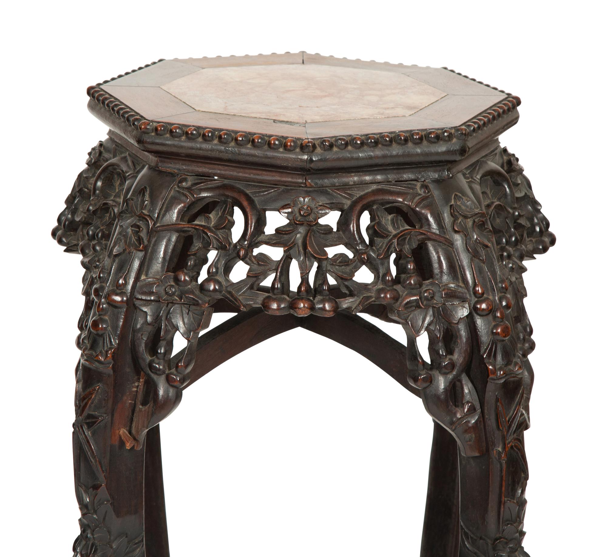 A Pair of Chinese Carved Rosewood Pedestals