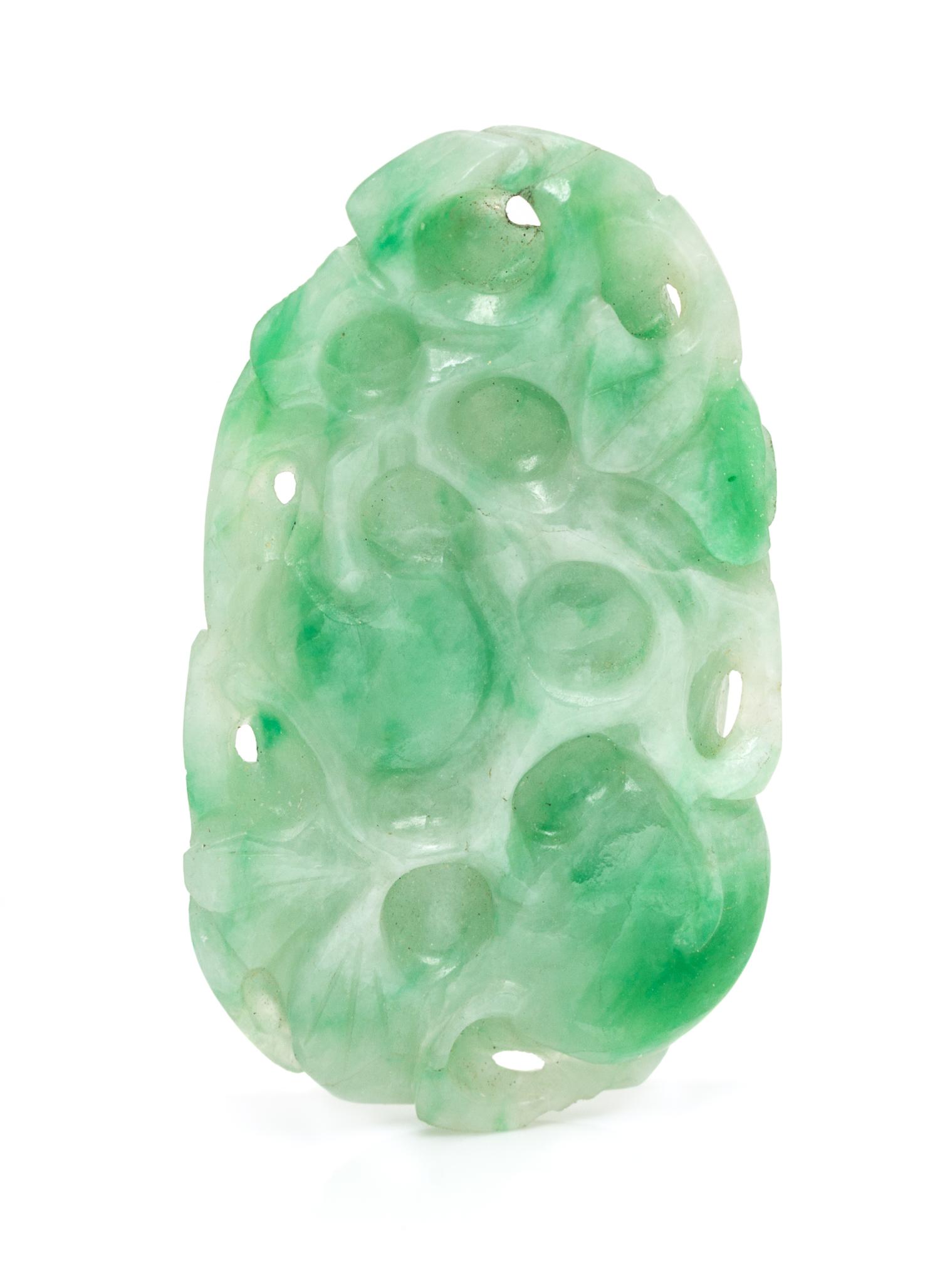 A Carved and Pierced Jadeite Jade Plaque,