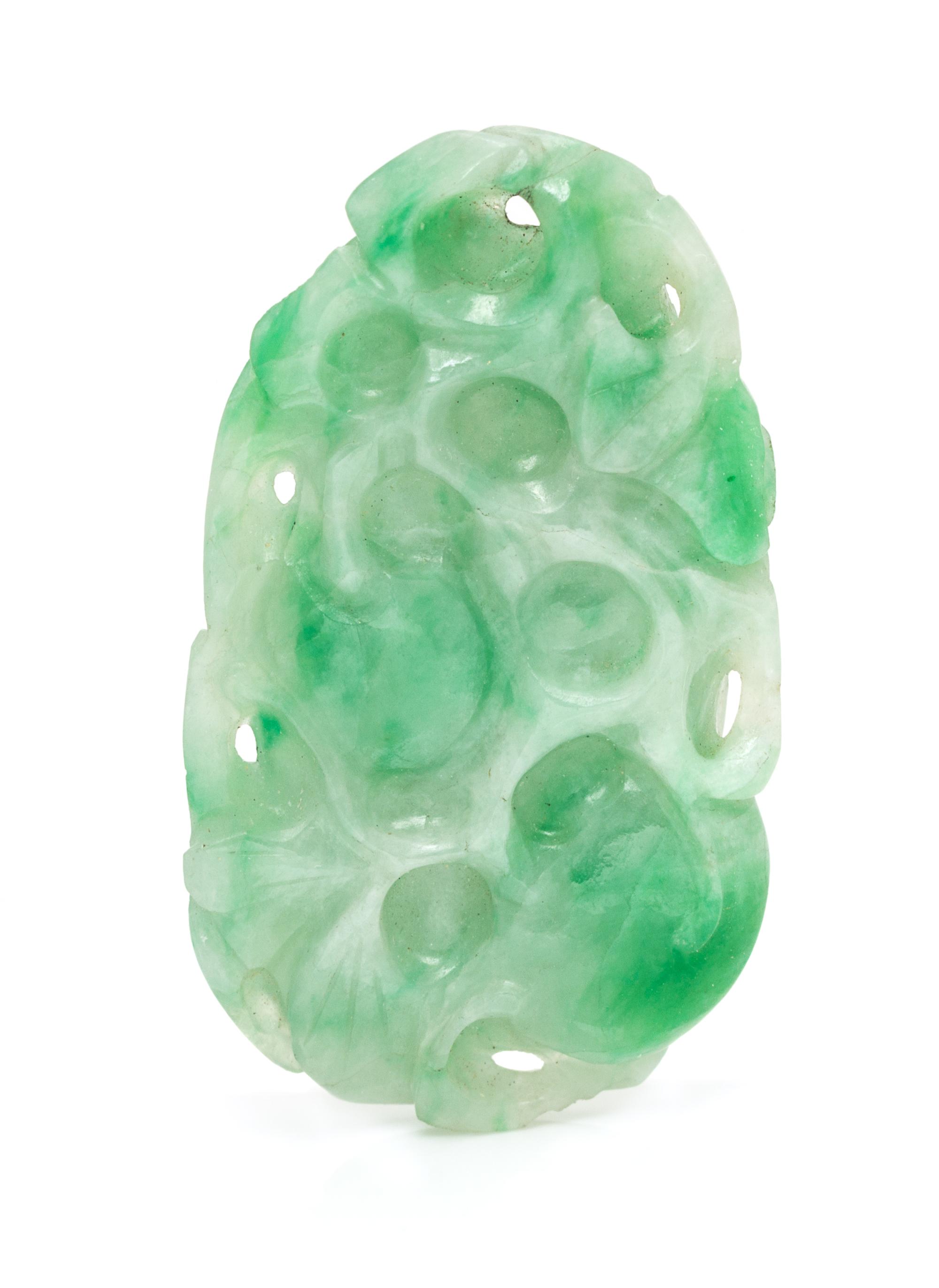 A Carved and Pierced Jadeite Jade Plaque,