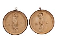A Pair of Poured Stone Relief Plaques