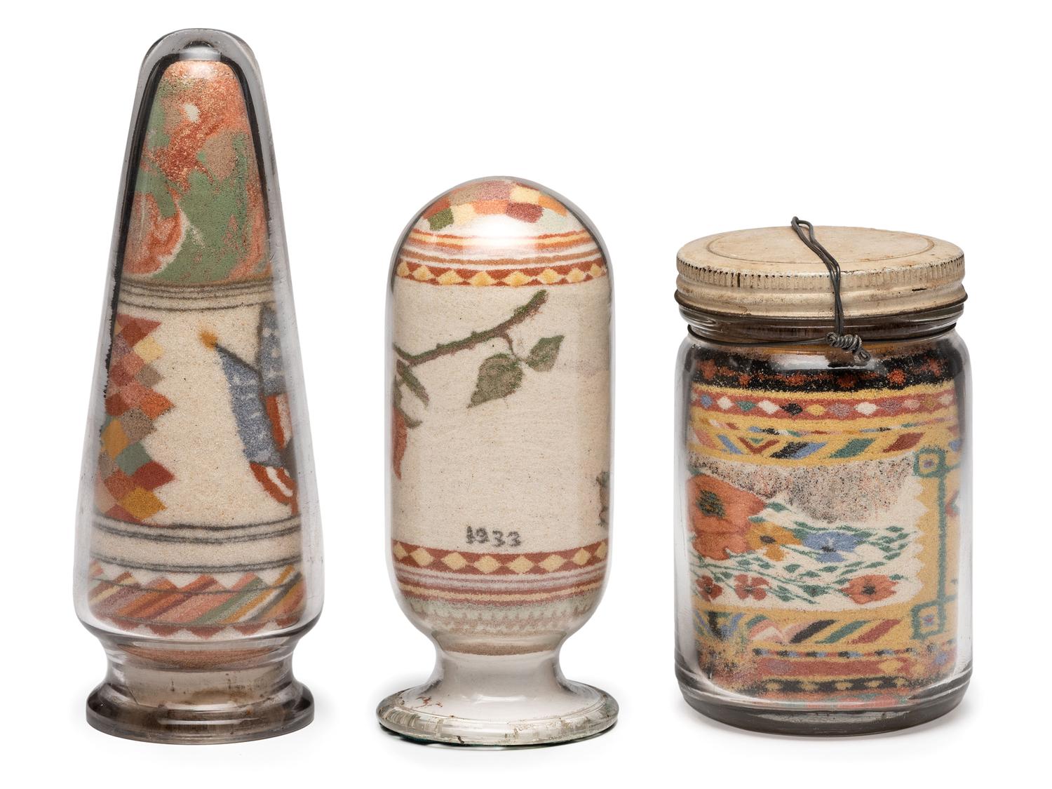 A Collection of John A. Adams Sand Art Bottles, Along with Custom Box and Unused Bottle