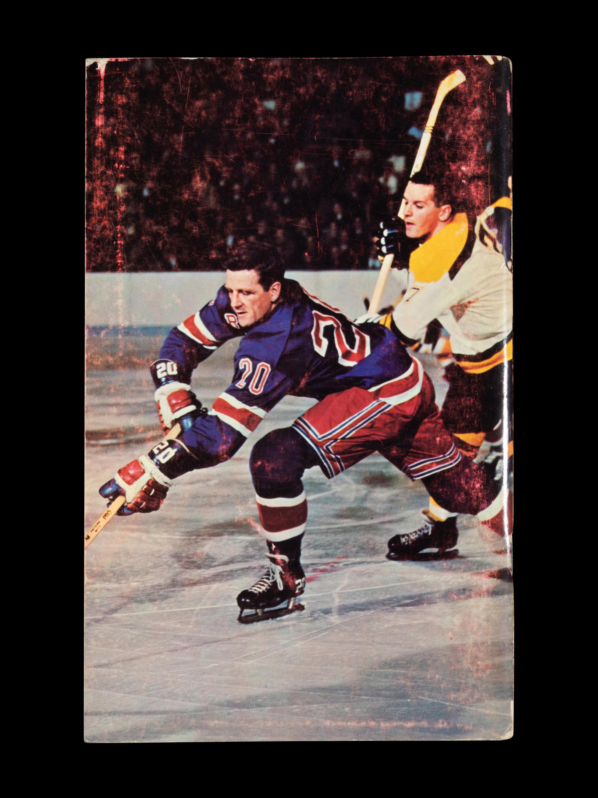 A Group of 16 1960s - 1980s New York Rangers Blue Book Media Guides,
