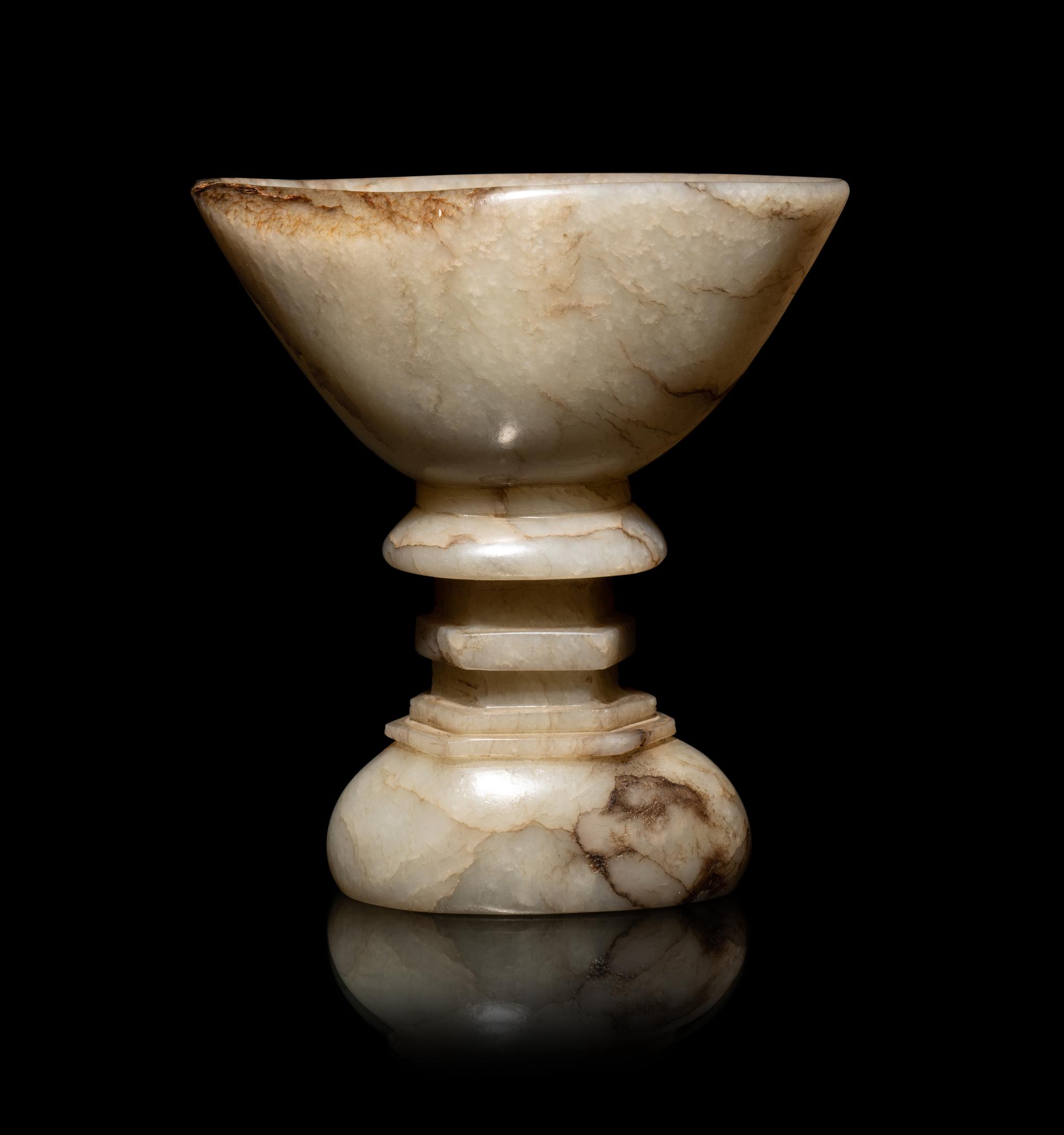 A Chinese Dark Russet White Jade Offering Bowl