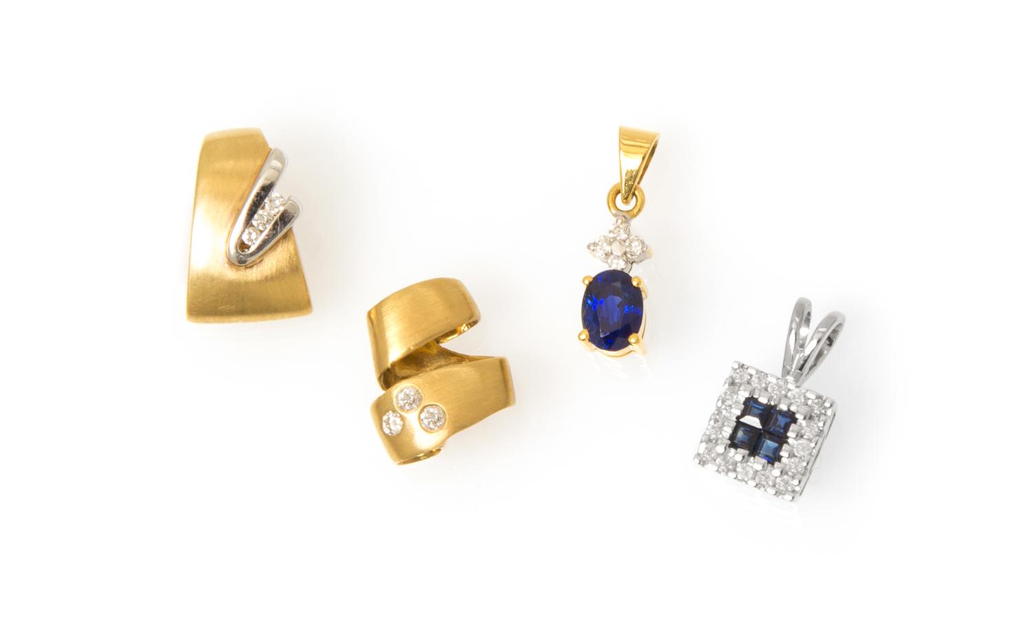 A Collection of 18 Karat Gold, Diamond and Sapphire Pendants, 6.20 dwts.