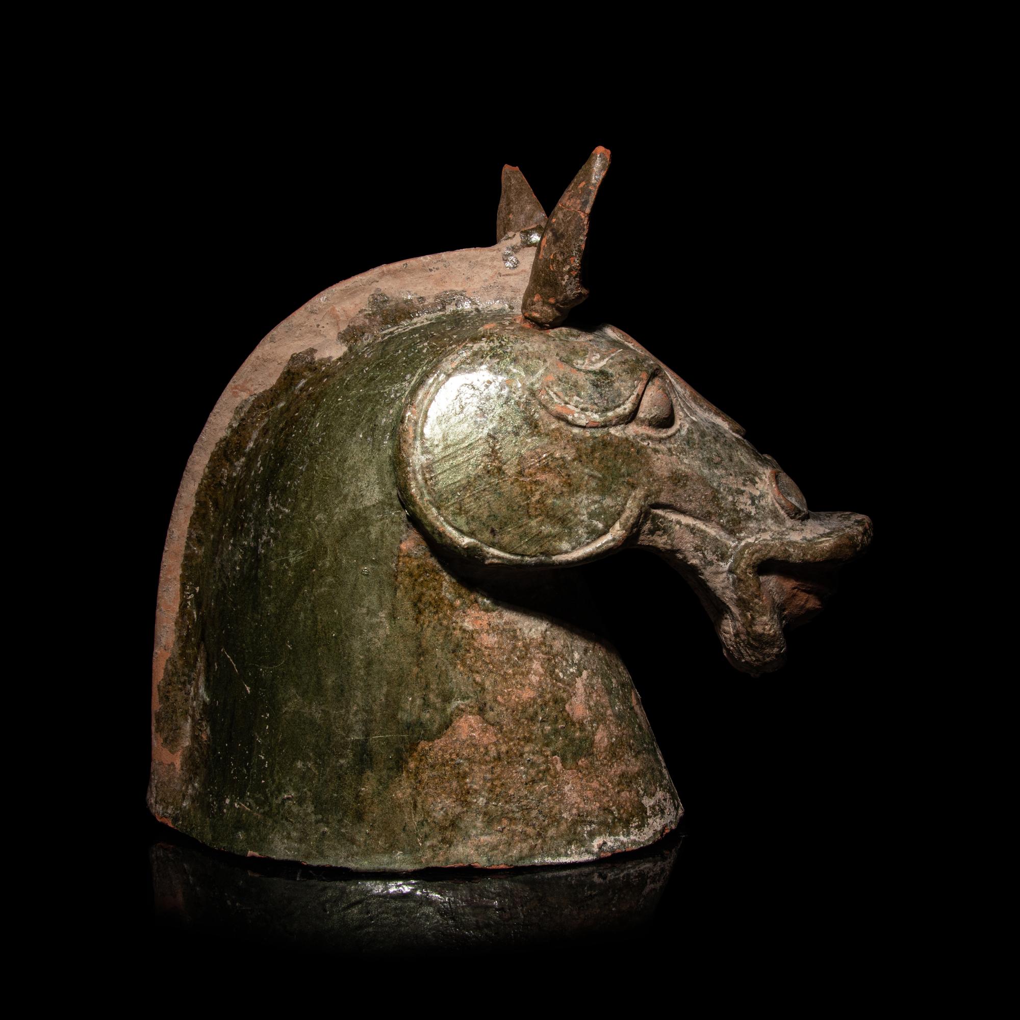 Three Chinese Pottery Equine Figures