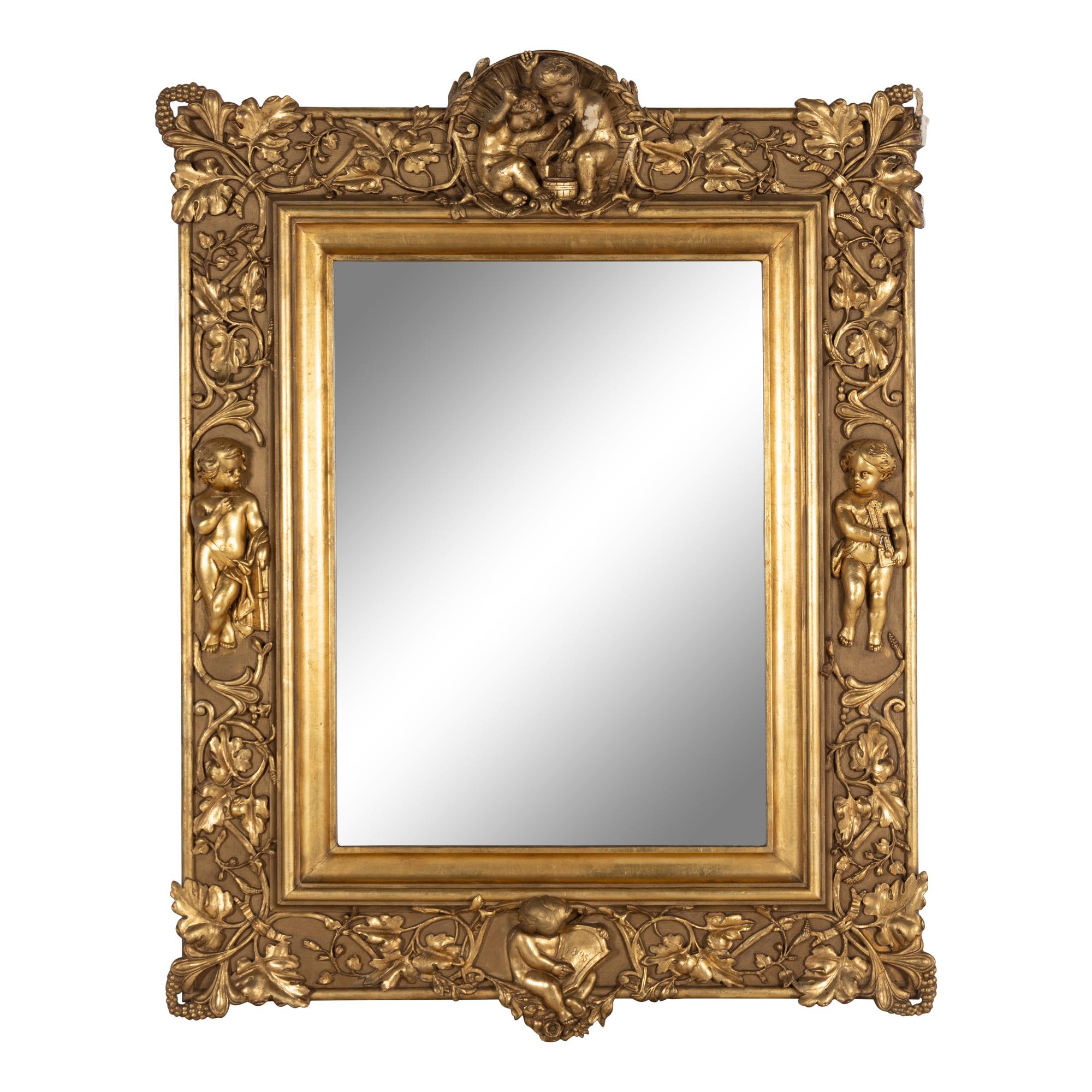 A Baroque Style Carved Giltwood and Gesso Figural Mirror