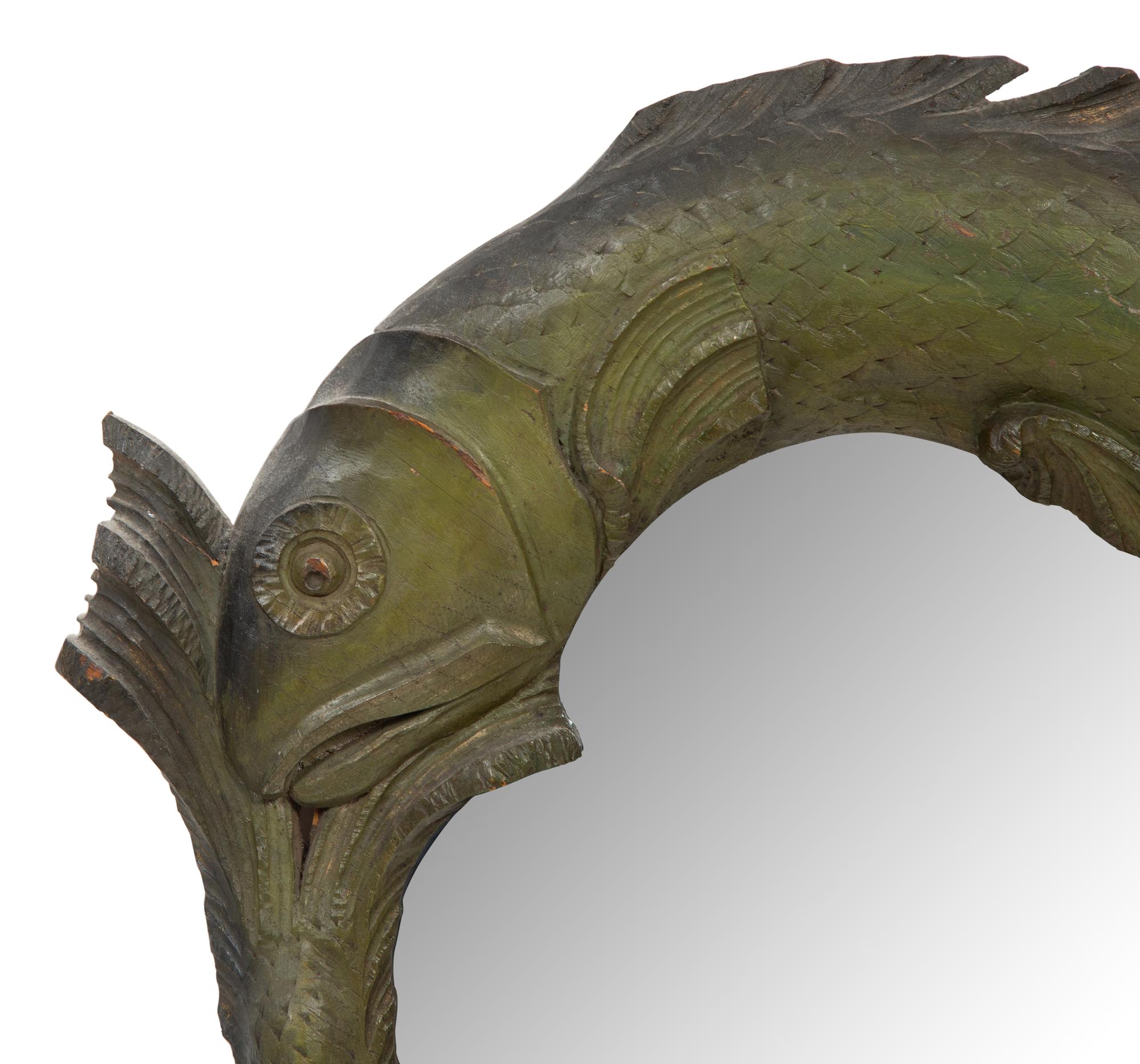 A Pair of Fish-Carved Wood Circular Mirrors