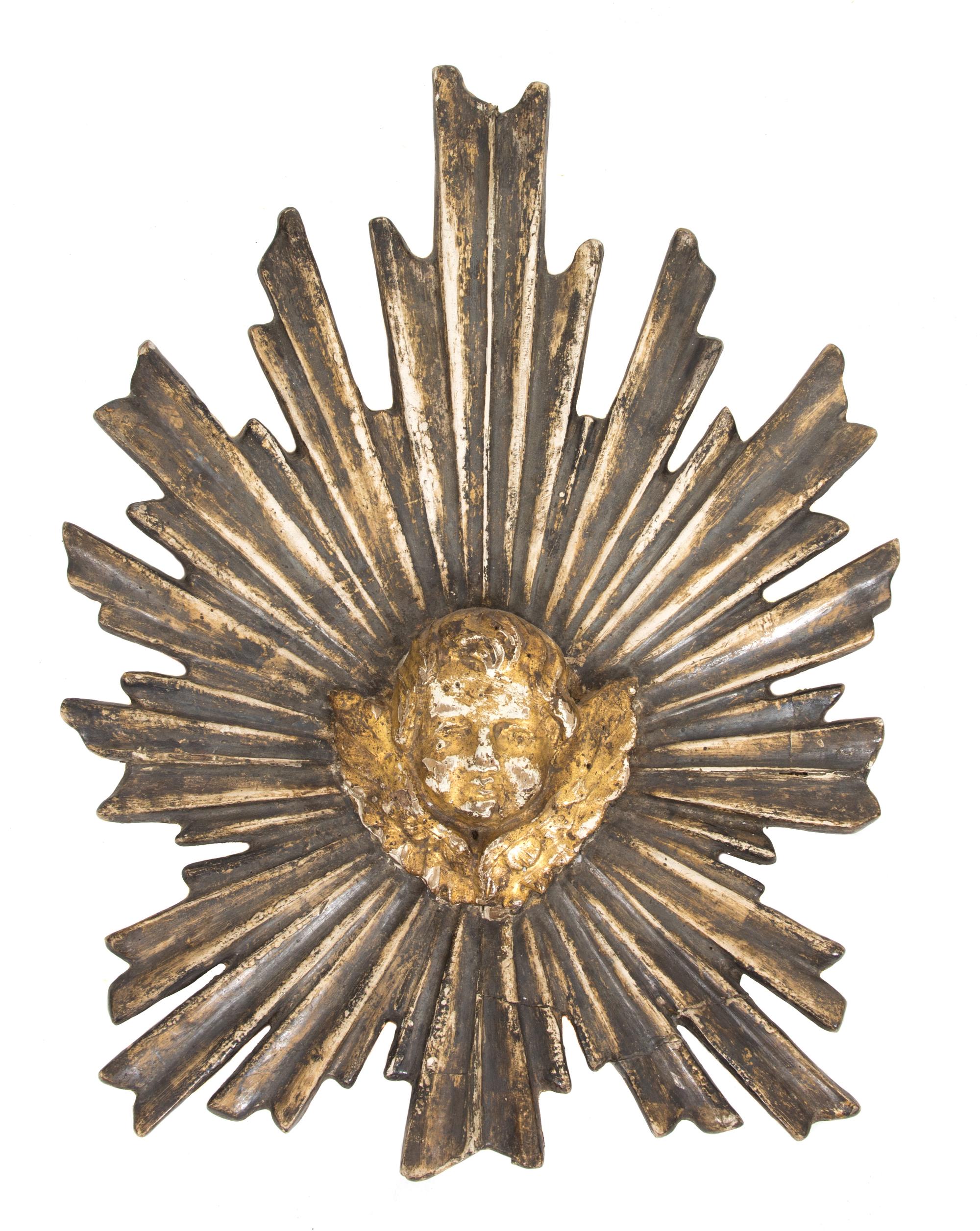 An Italian Carved Gilt and Silvered Wood Sunburst Applique Height 15 inches. — 18TH/19TH CENTURY