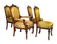 A Continental Parcel Gilt Walnut Four-Piece Seating Suite