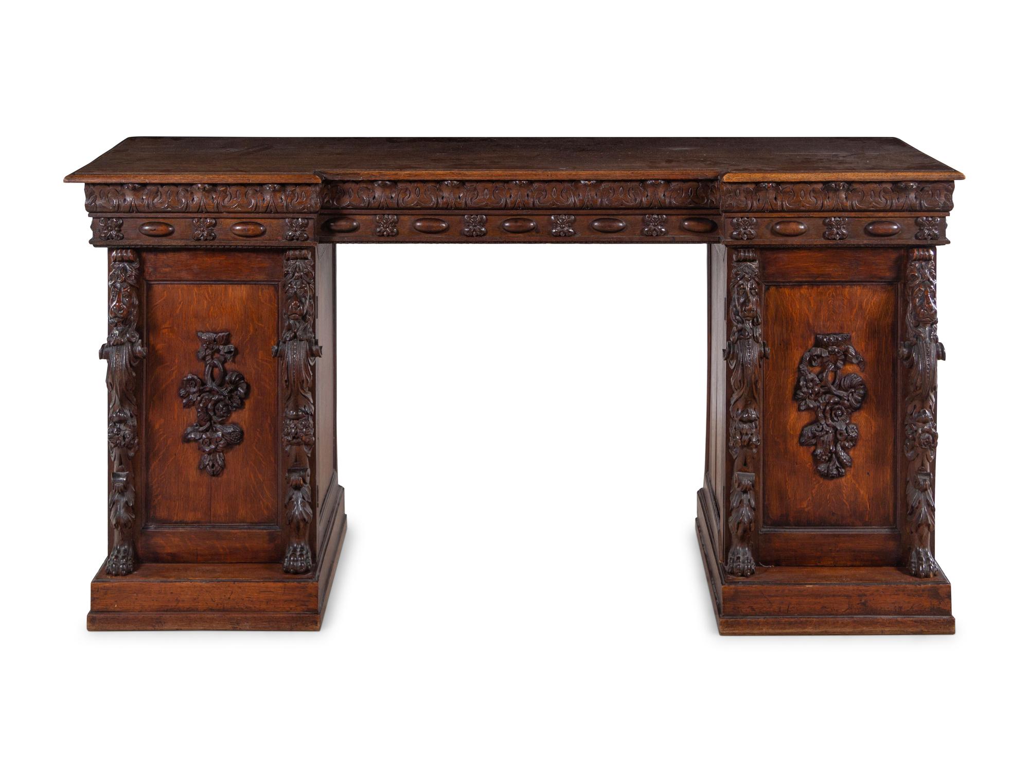 An English Carved Oak Pedestal-Base Server