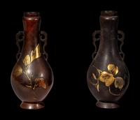 A Pair of Japanese Gilt Highlighted Bronze Handled Vases