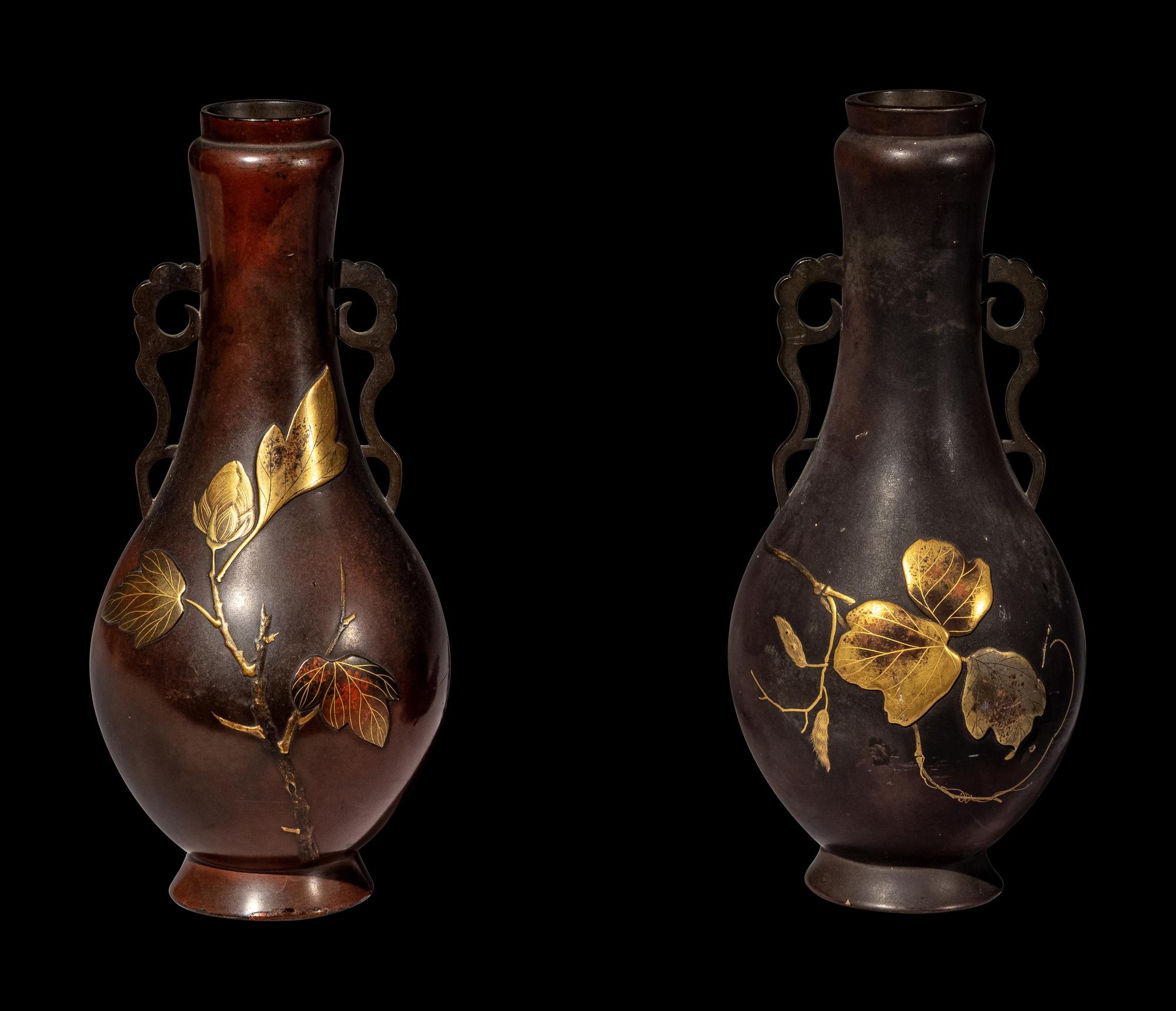 A Pair of Japanese Gilt Highlighted Bronze Handled Vases